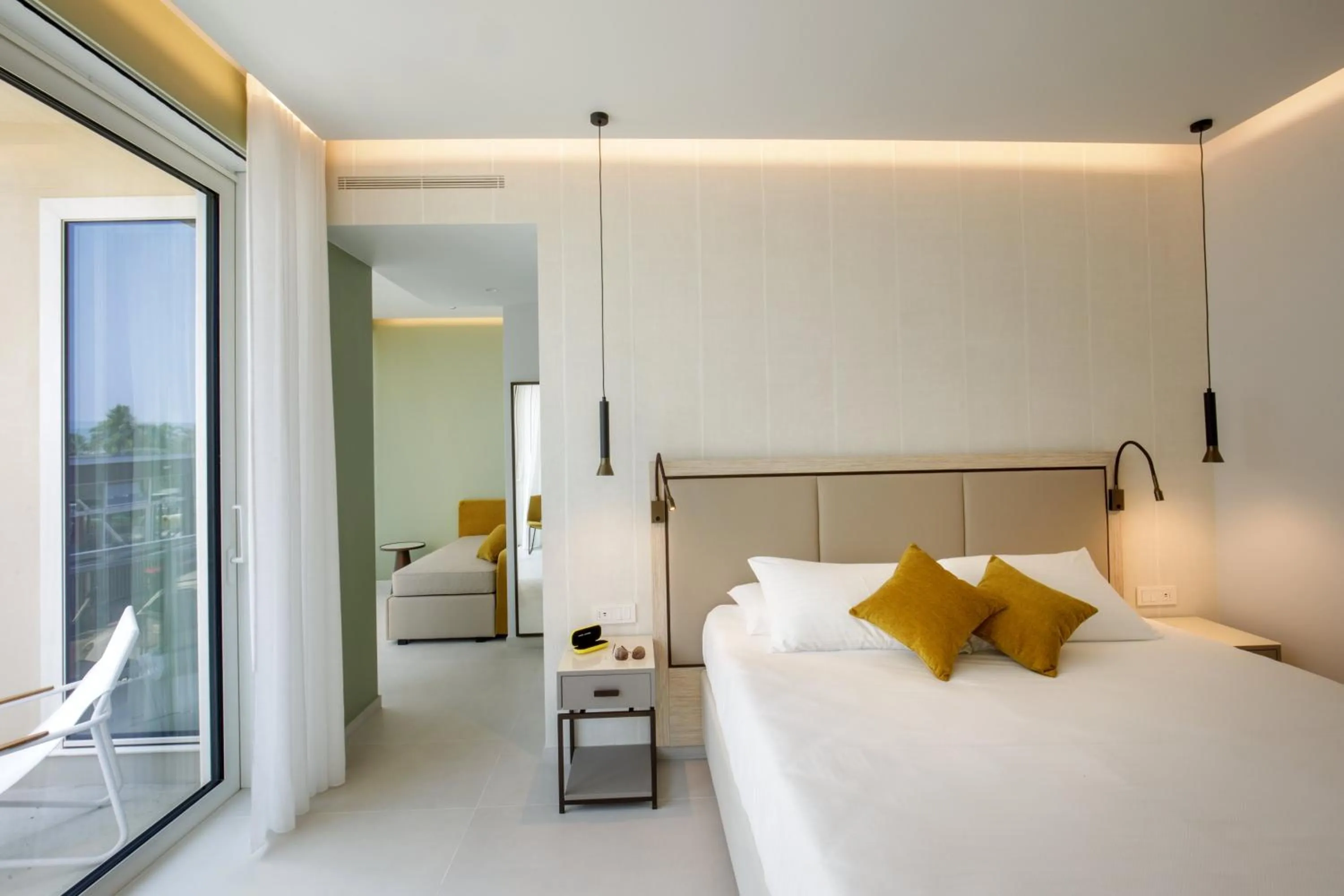 Bed in Ambasciatori Suite Hotel