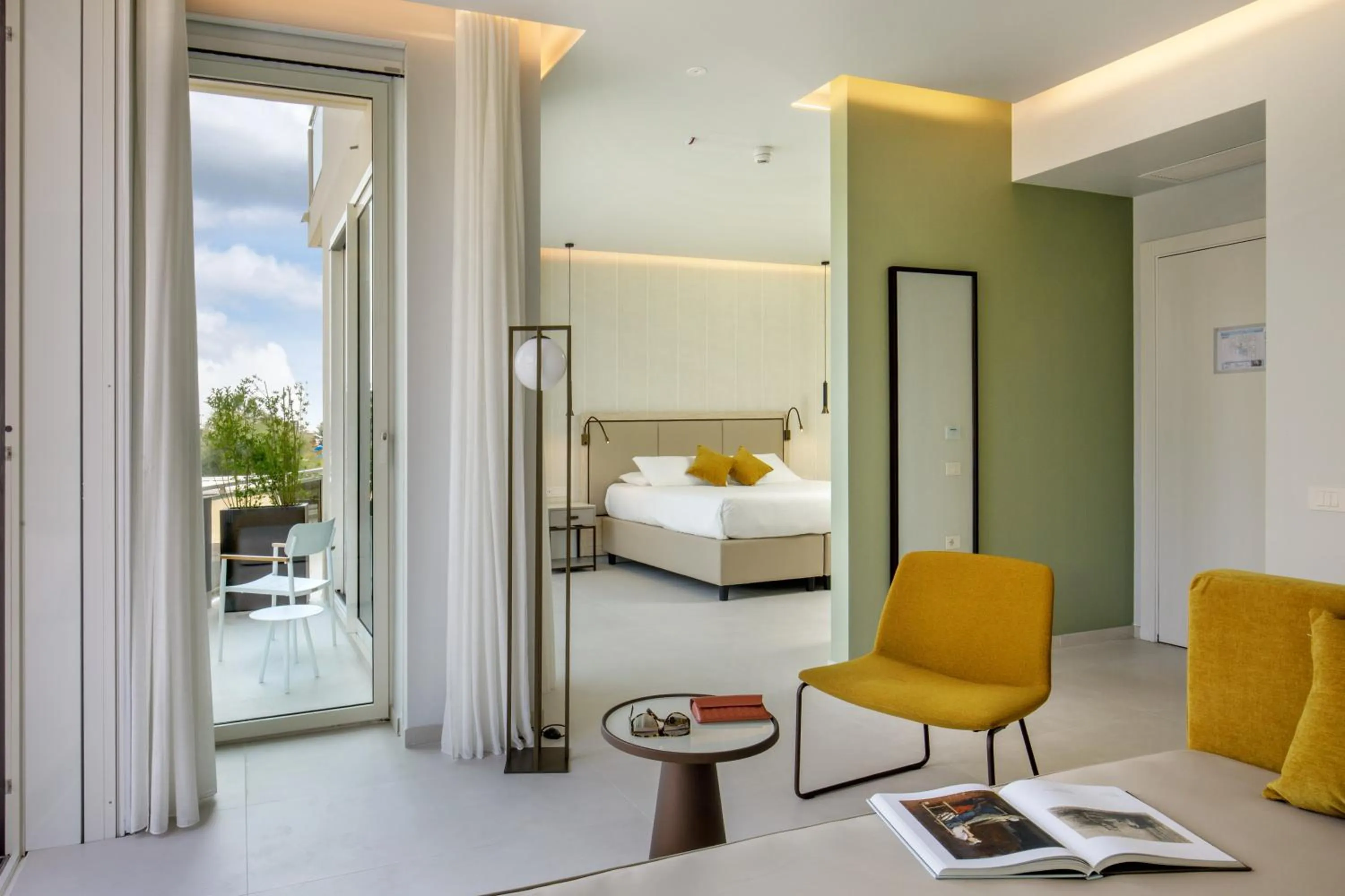 Bed in Ambasciatori Suite Hotel