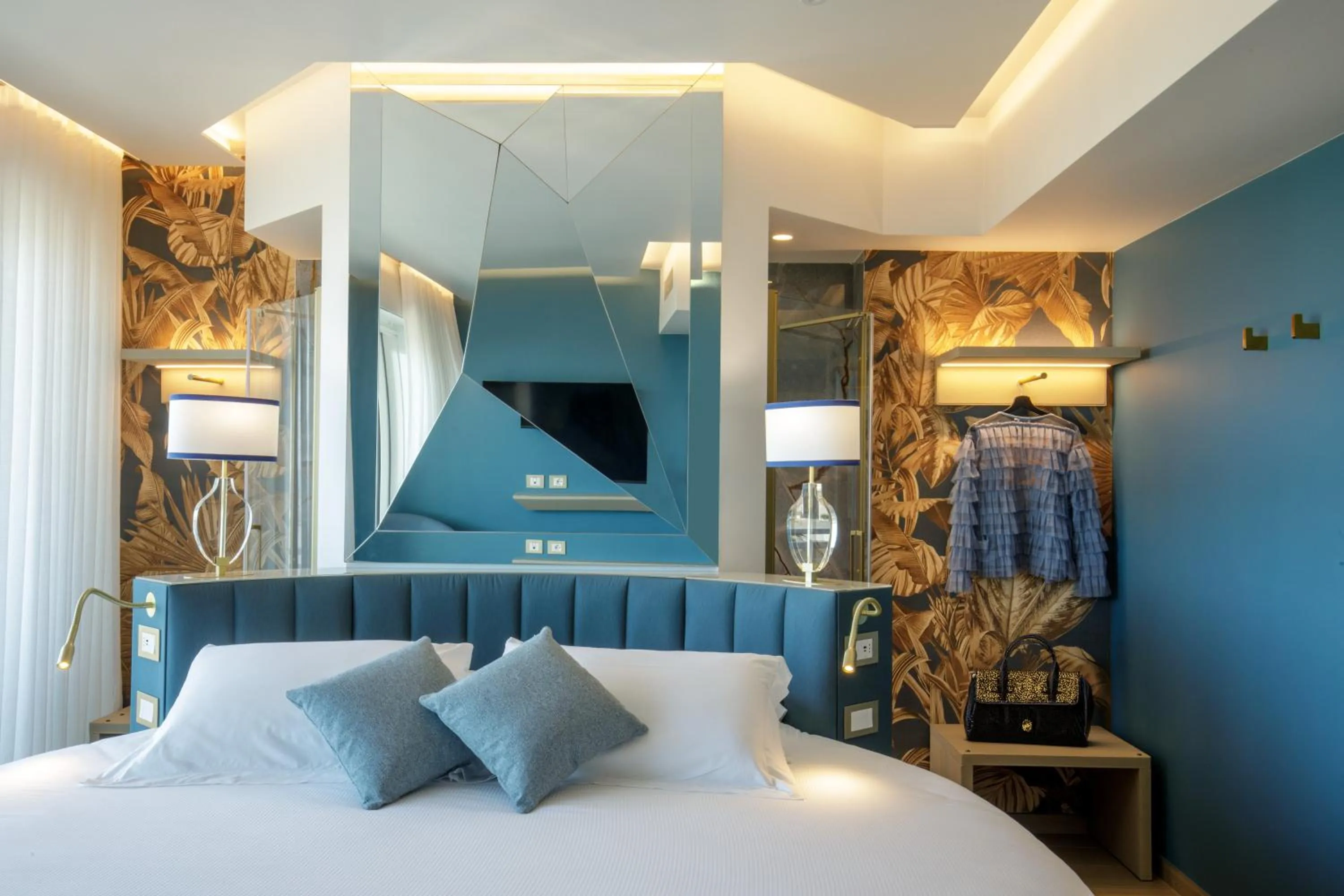 Bed in Ambasciatori Suite Hotel