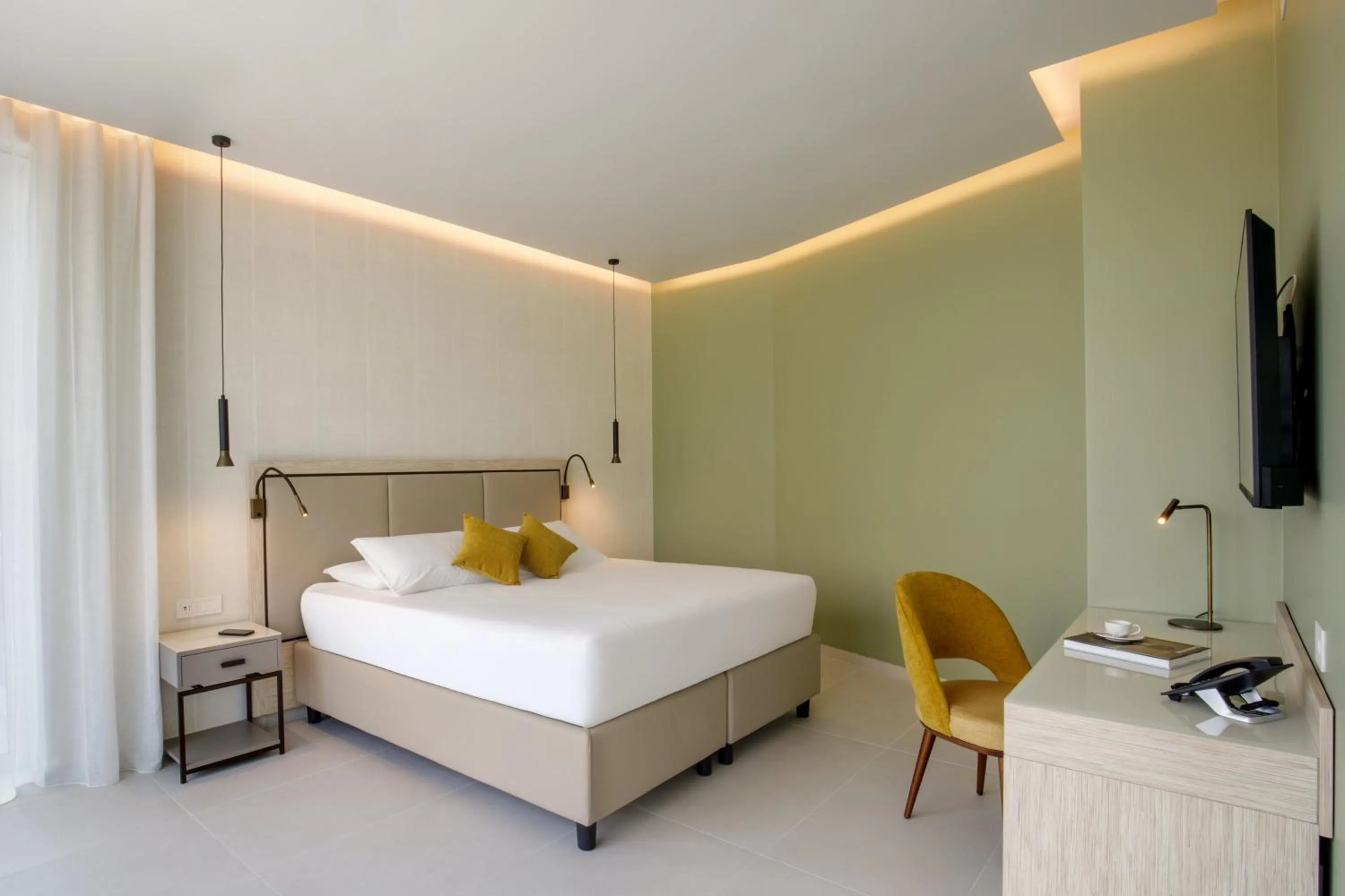 Bed in Ambasciatori Suite Hotel