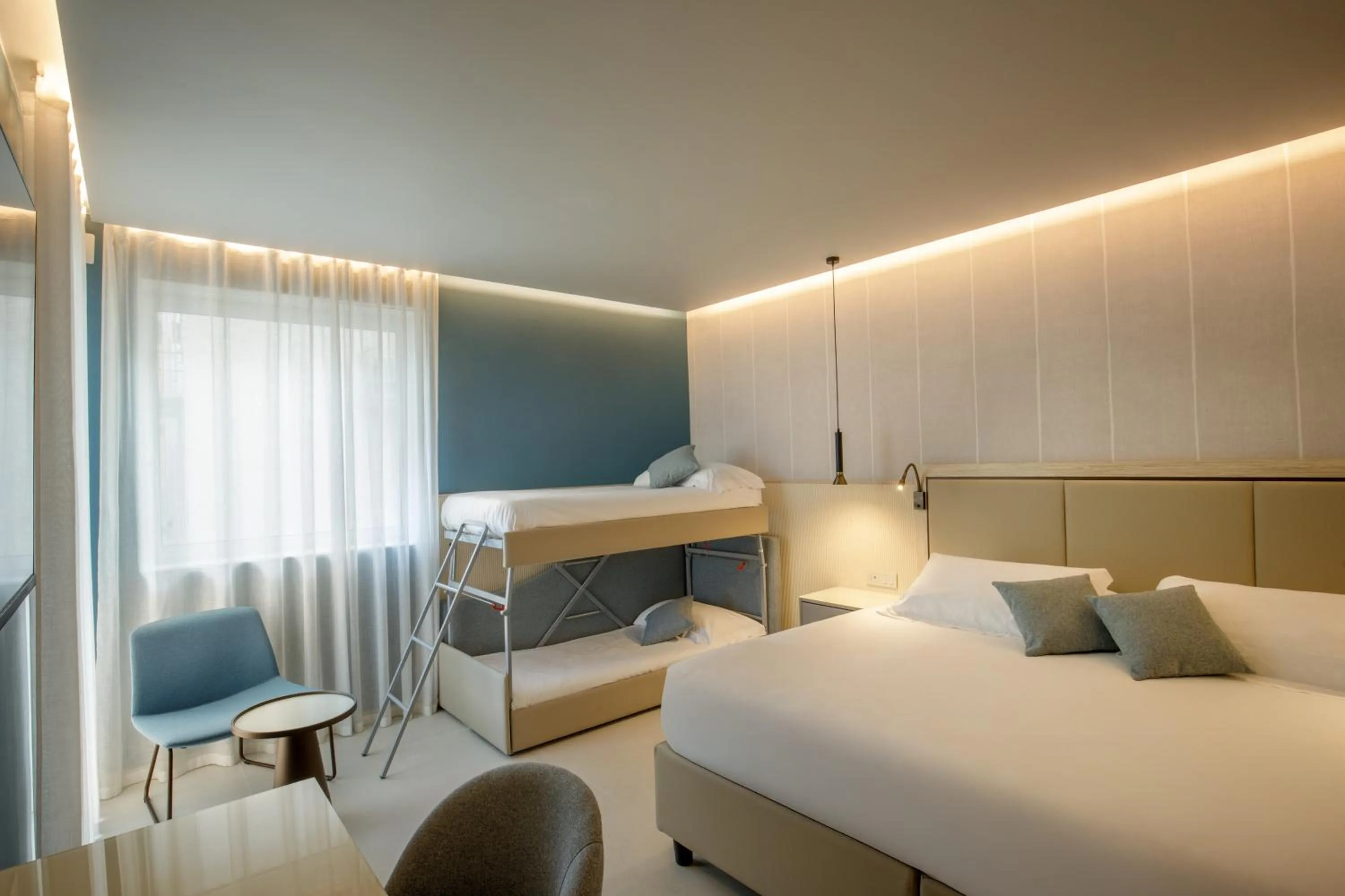 Bed in Ambasciatori Suite Hotel