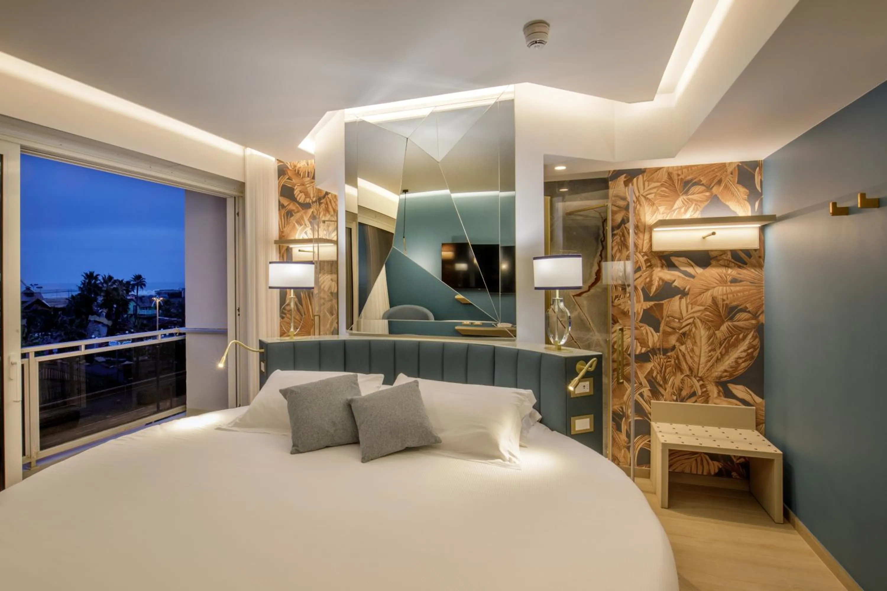 Bed in Ambasciatori Suite Hotel