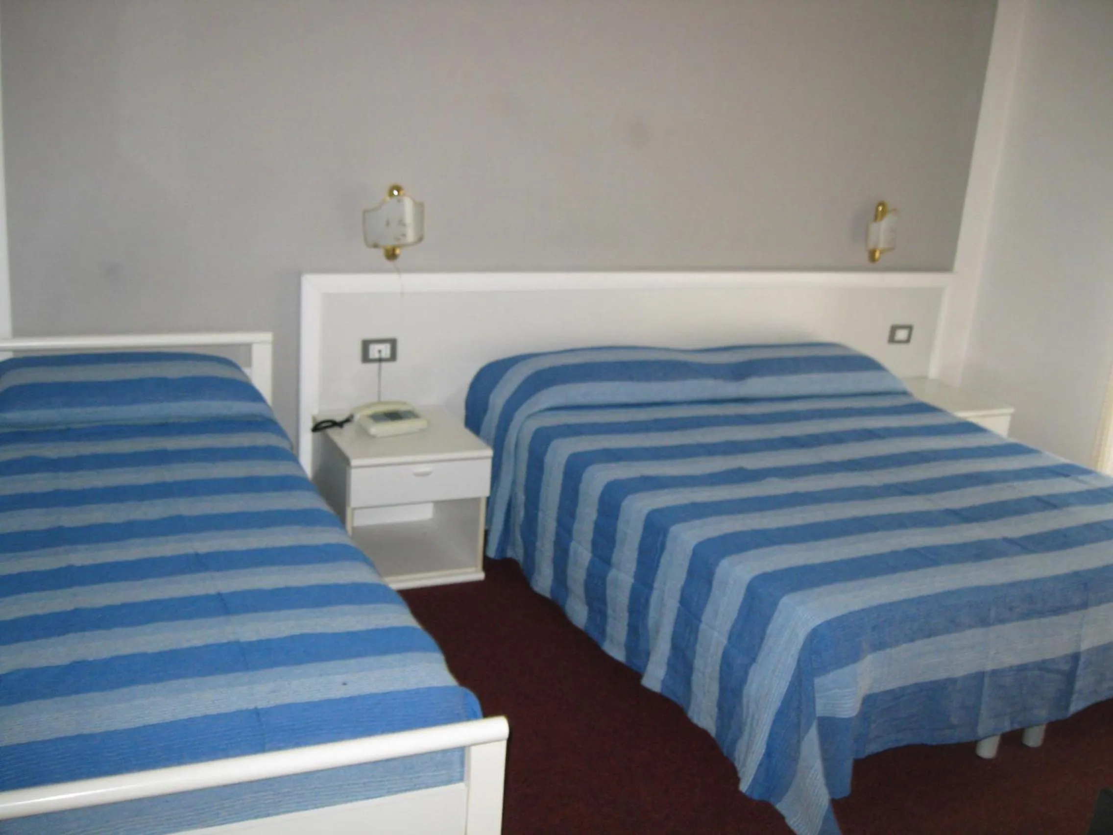 Bed in Hotel Acqua Marina