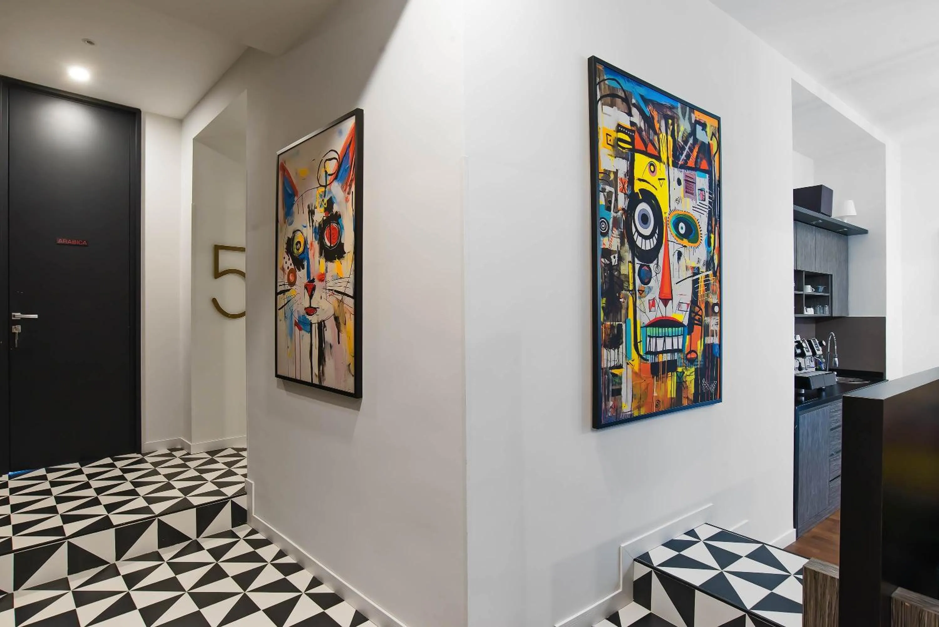 Kitchen or kitchenette in Gram Suites