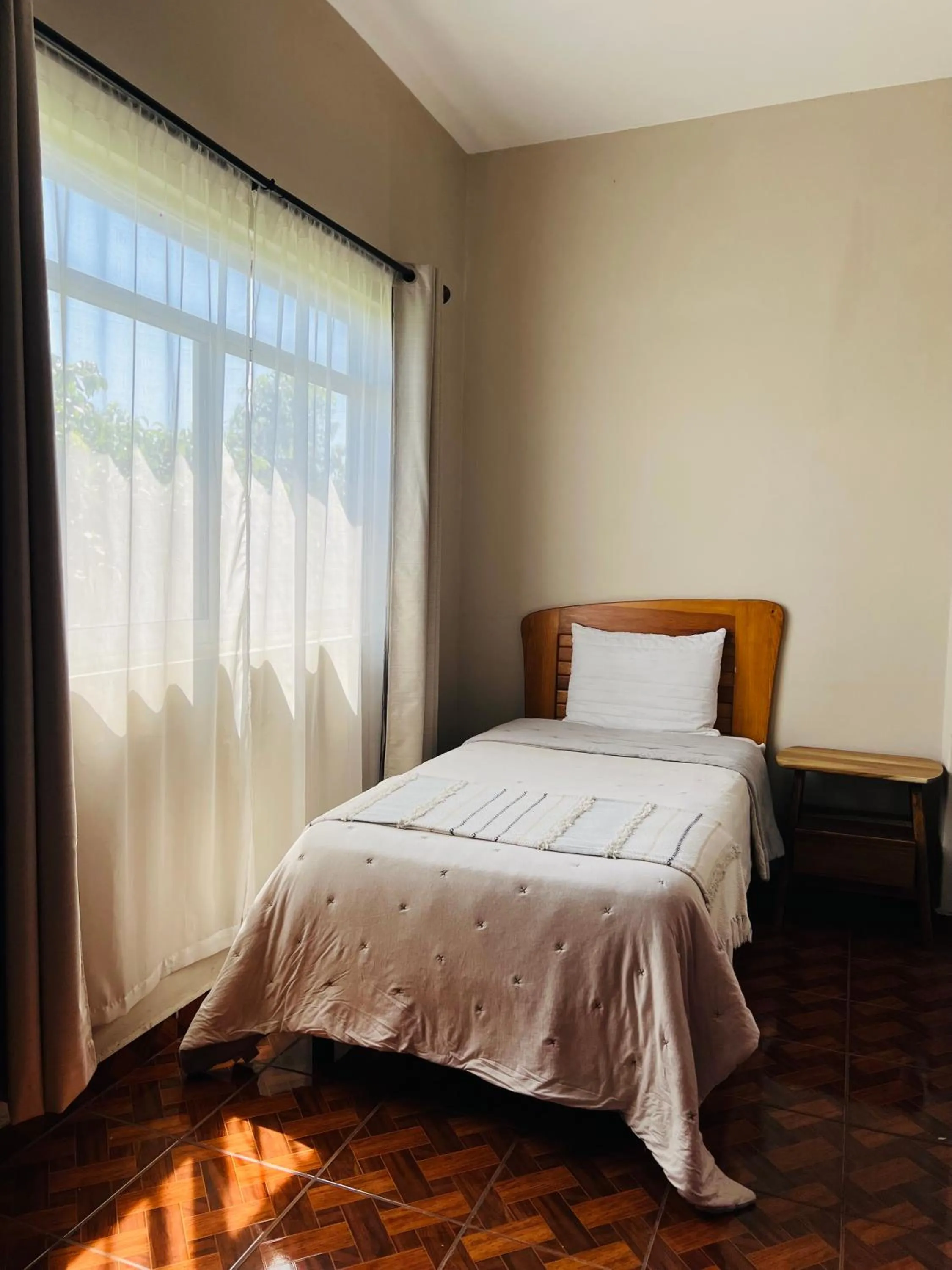 Bed in Hostería Casa Marquez