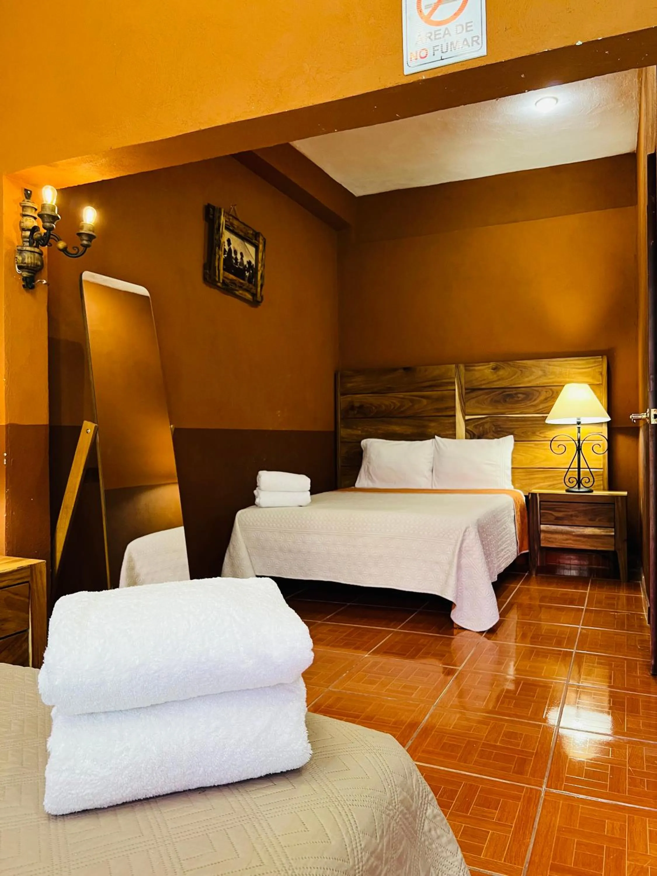 Bed in Hostería Casa Marquez