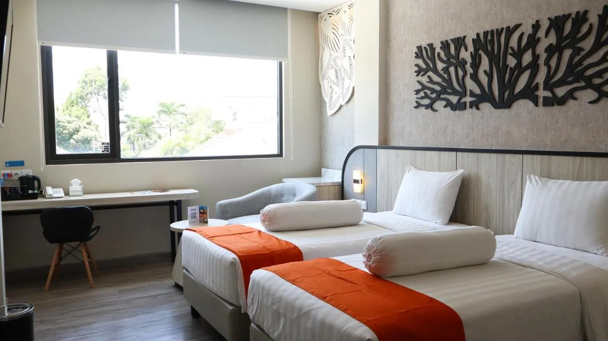 Bed in Front One Gosyen Hotel Salatiga