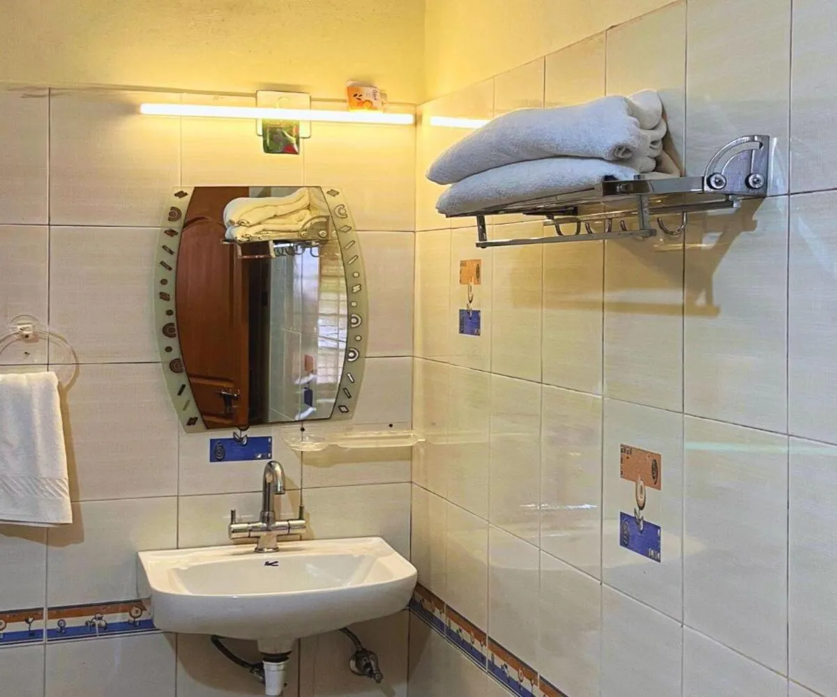 Bathroom in Misty Heights by The Sanihara