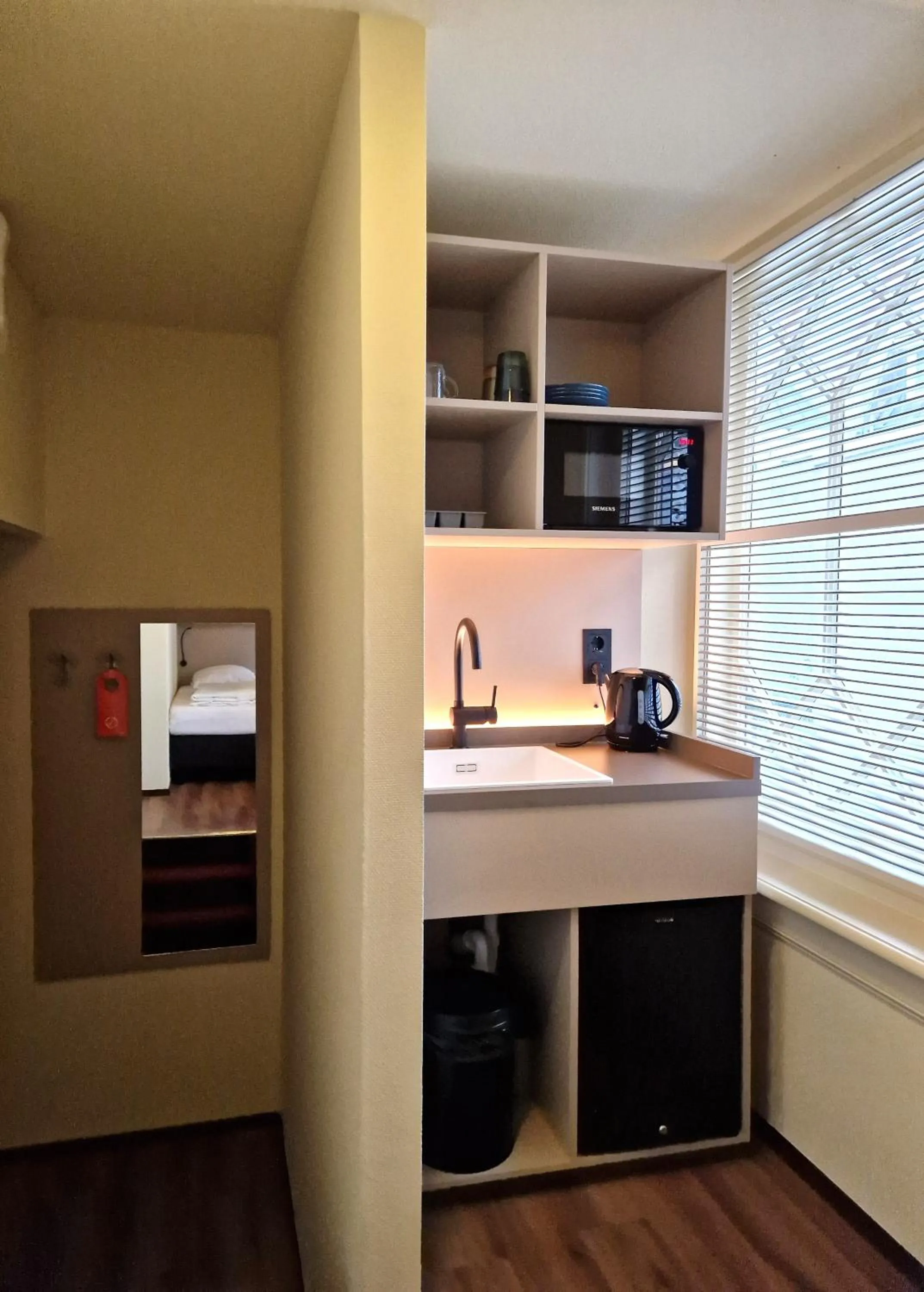 Kitchen or kitchenette in A-Train Hotel