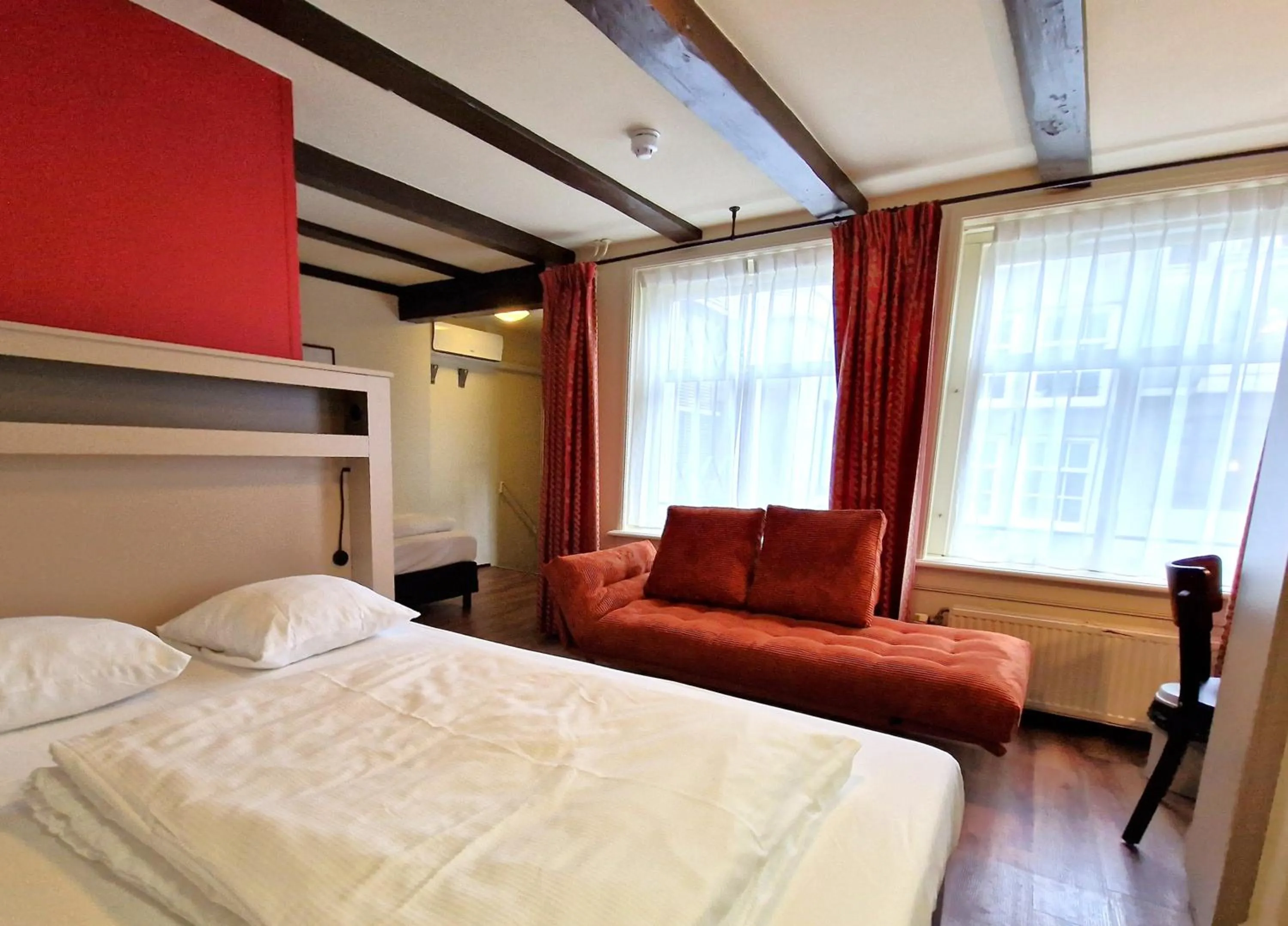 Photo of the whole room, Bed in A-Train Hotel