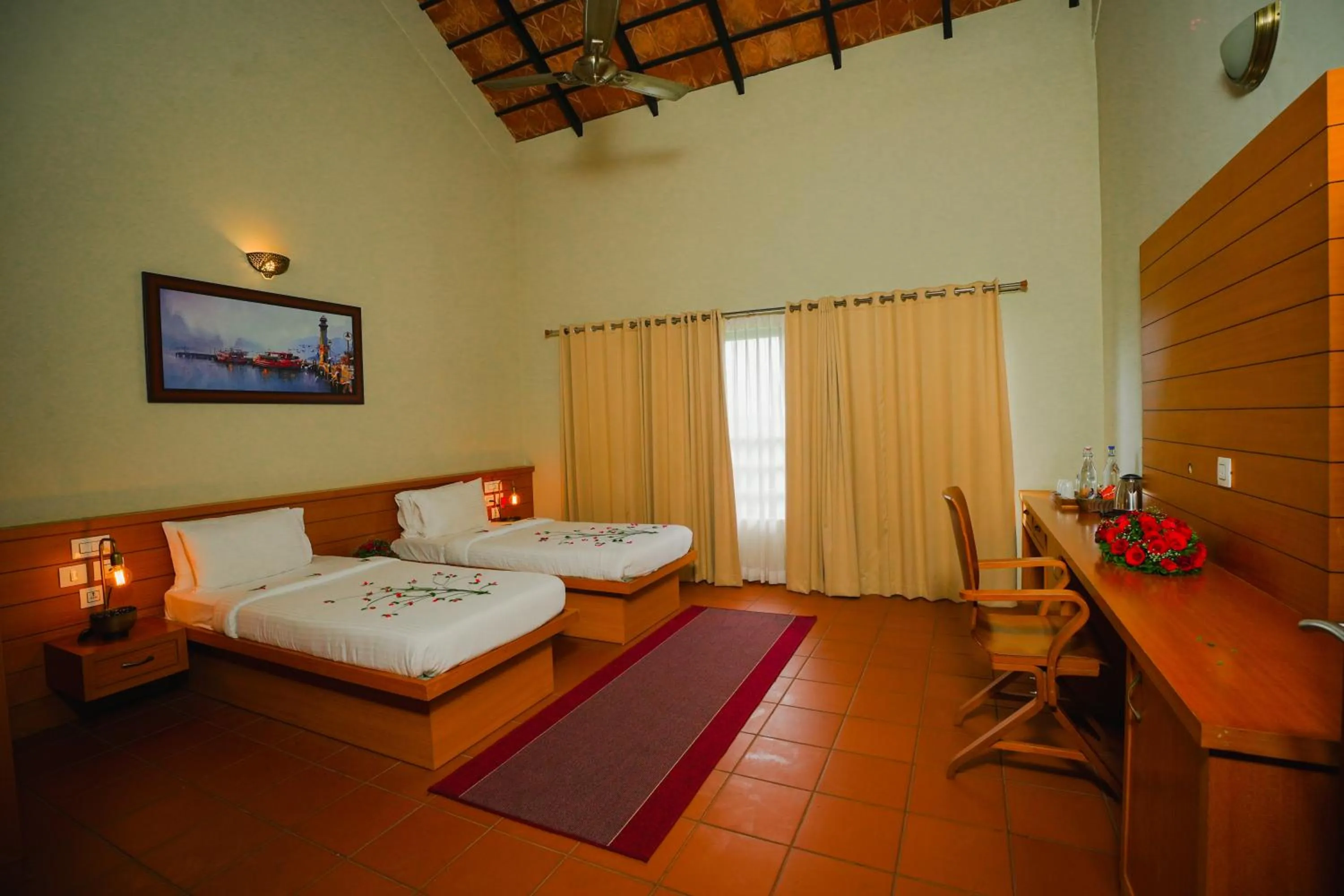 Bed in Vaidekam Resorts & Wellness, Kannur