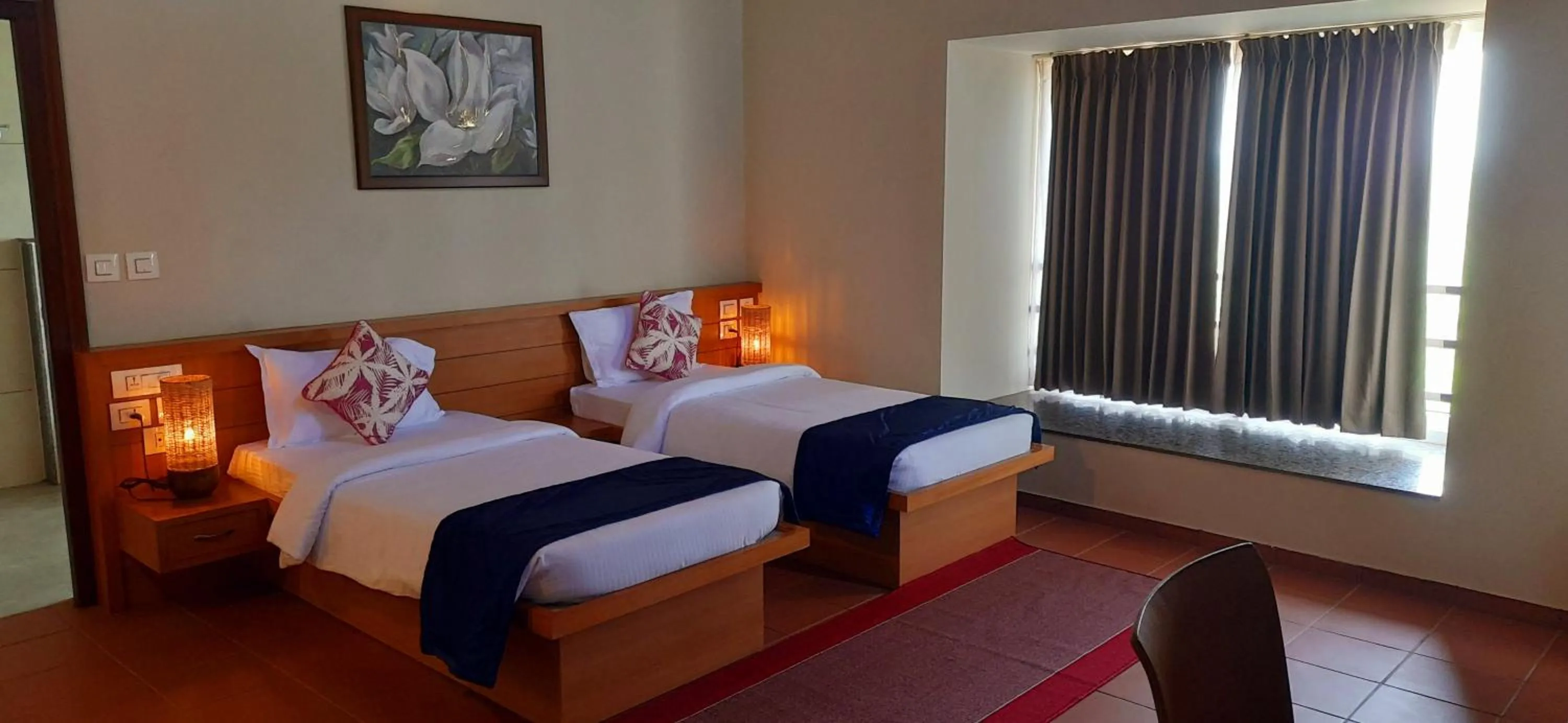 Bed in Vaidekam Resorts & Wellness, Kannur