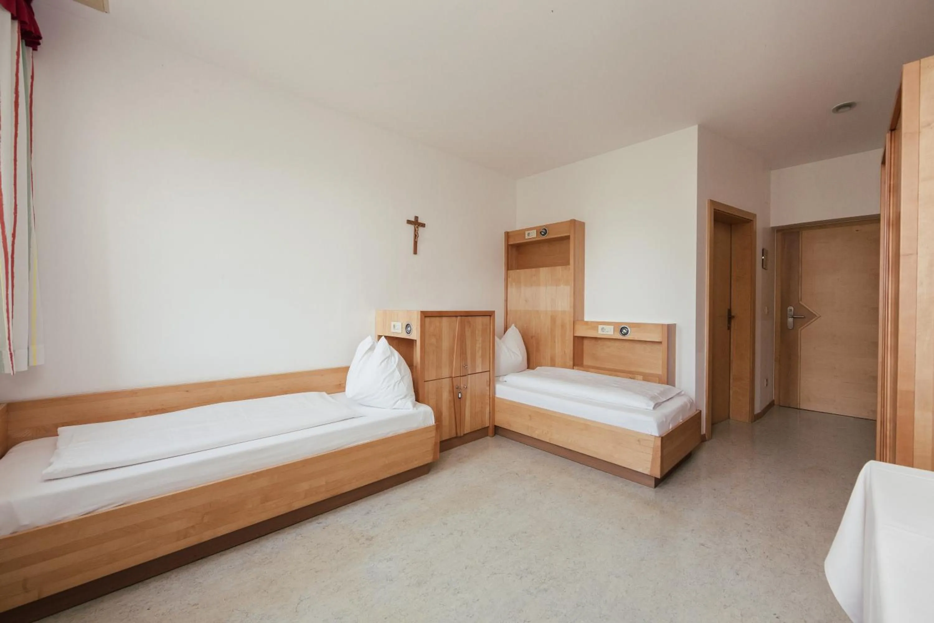 Photo of the whole room, Bed in Gästehaus Salvatorianerinnen