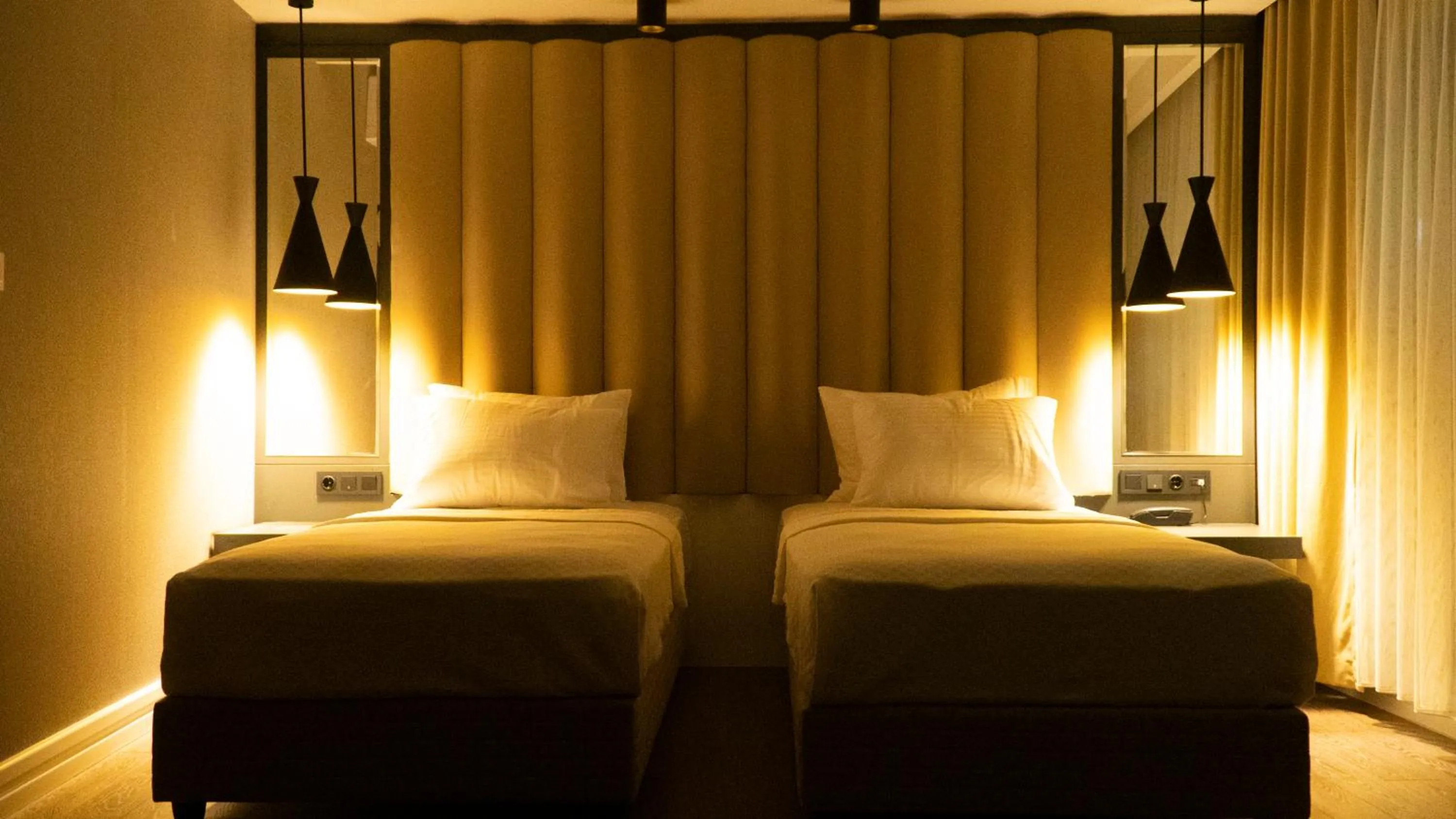 Photo of the whole room, Bed in Bloom Suite Hotel