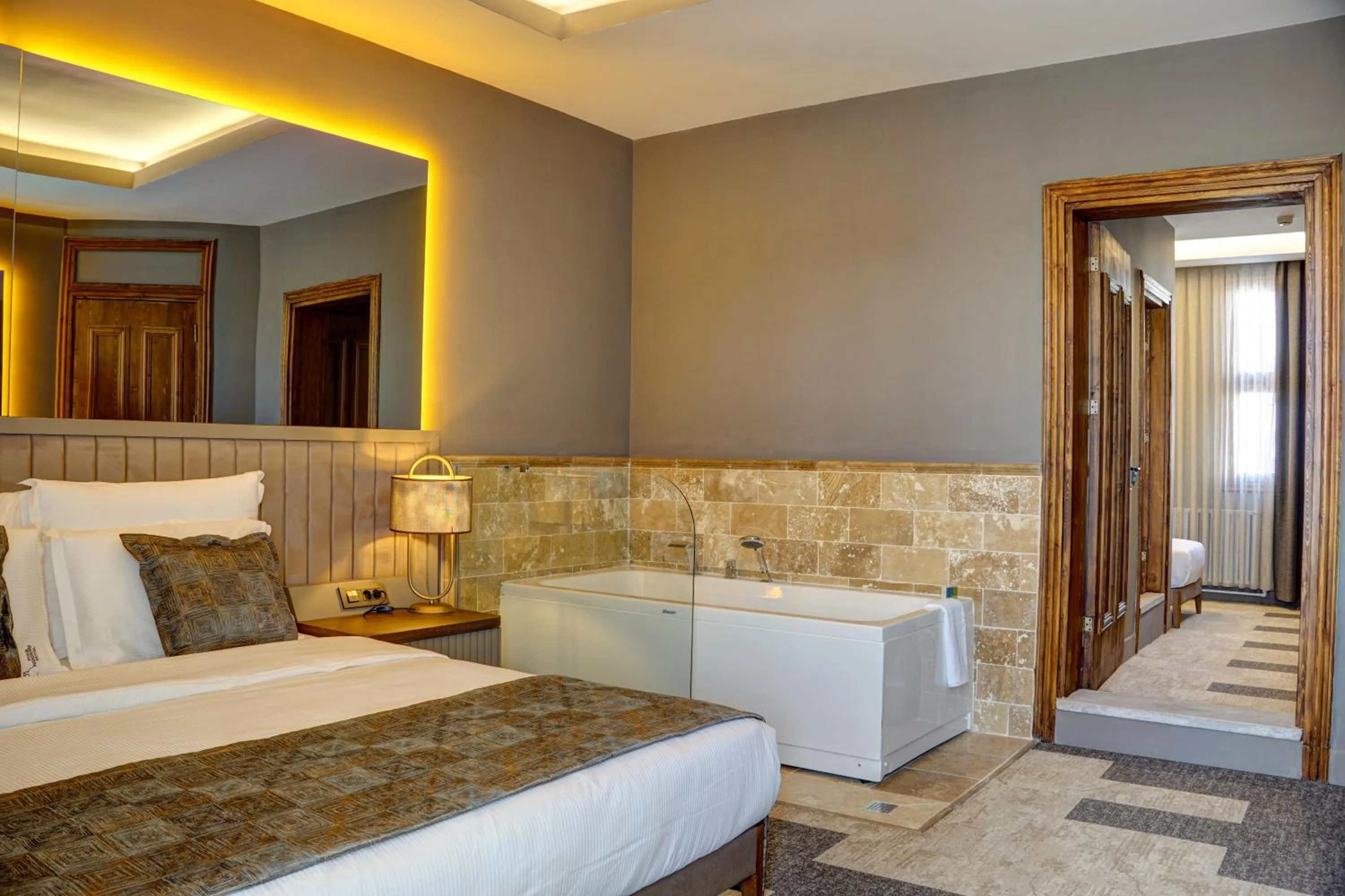 Bed in Four Mansions Hotel