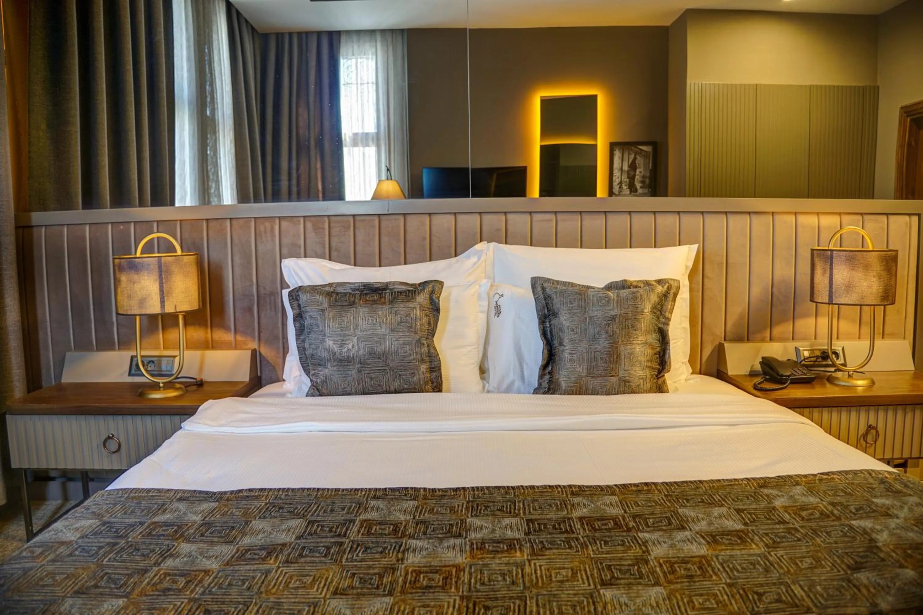 Bed in Four Mansions Hotel