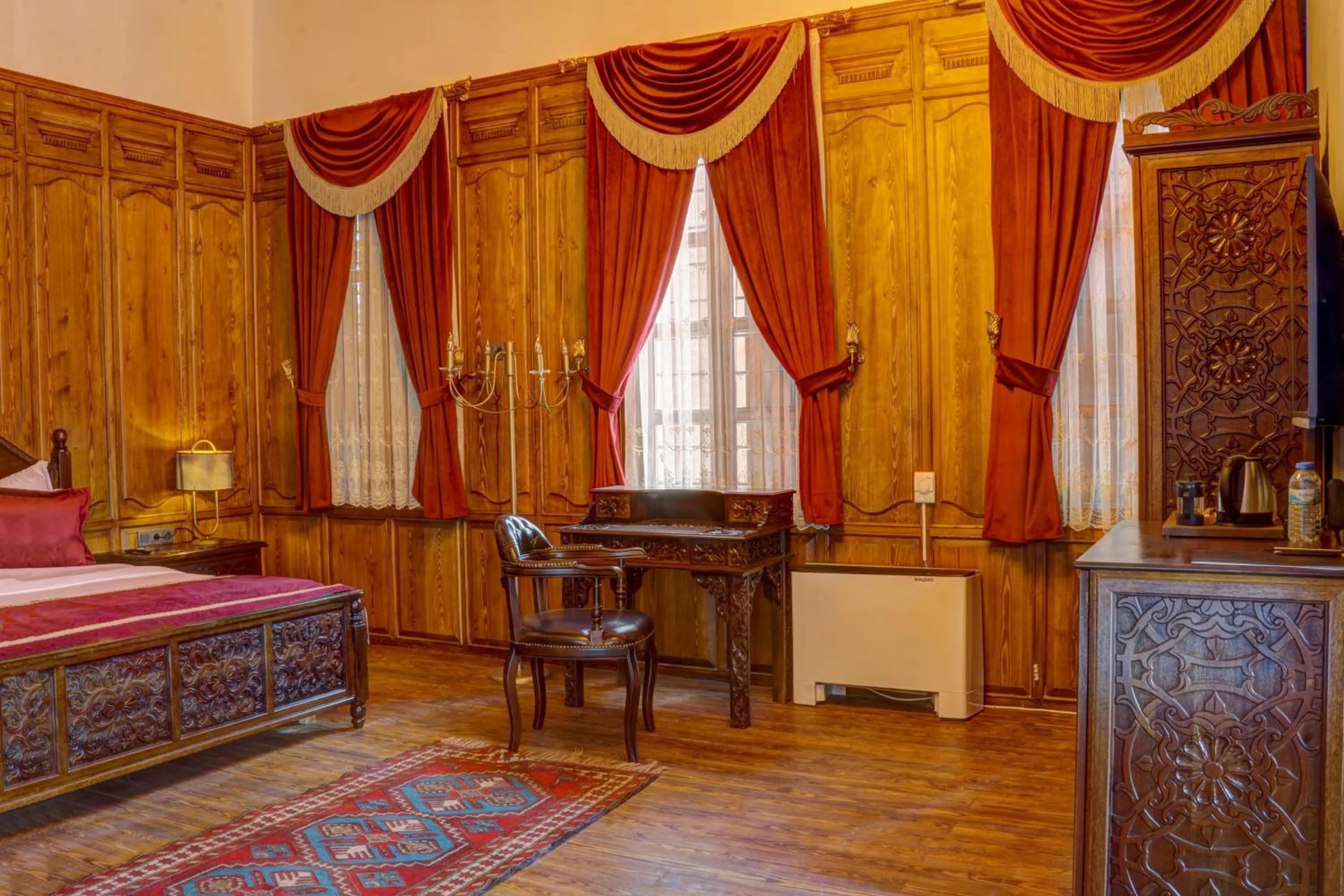 Bed in Four Mansions Hotel