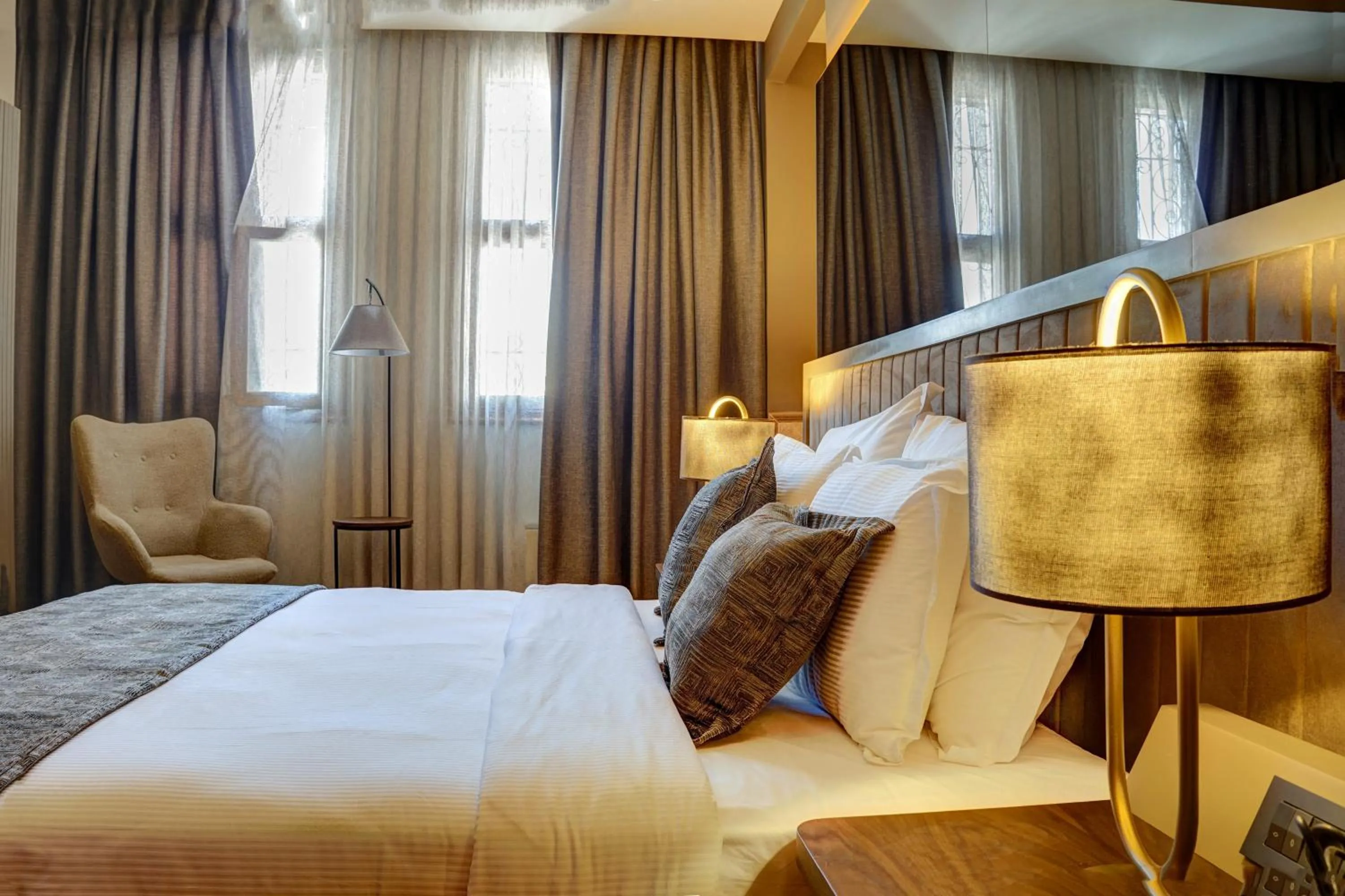 Bed in Four Mansions Hotel