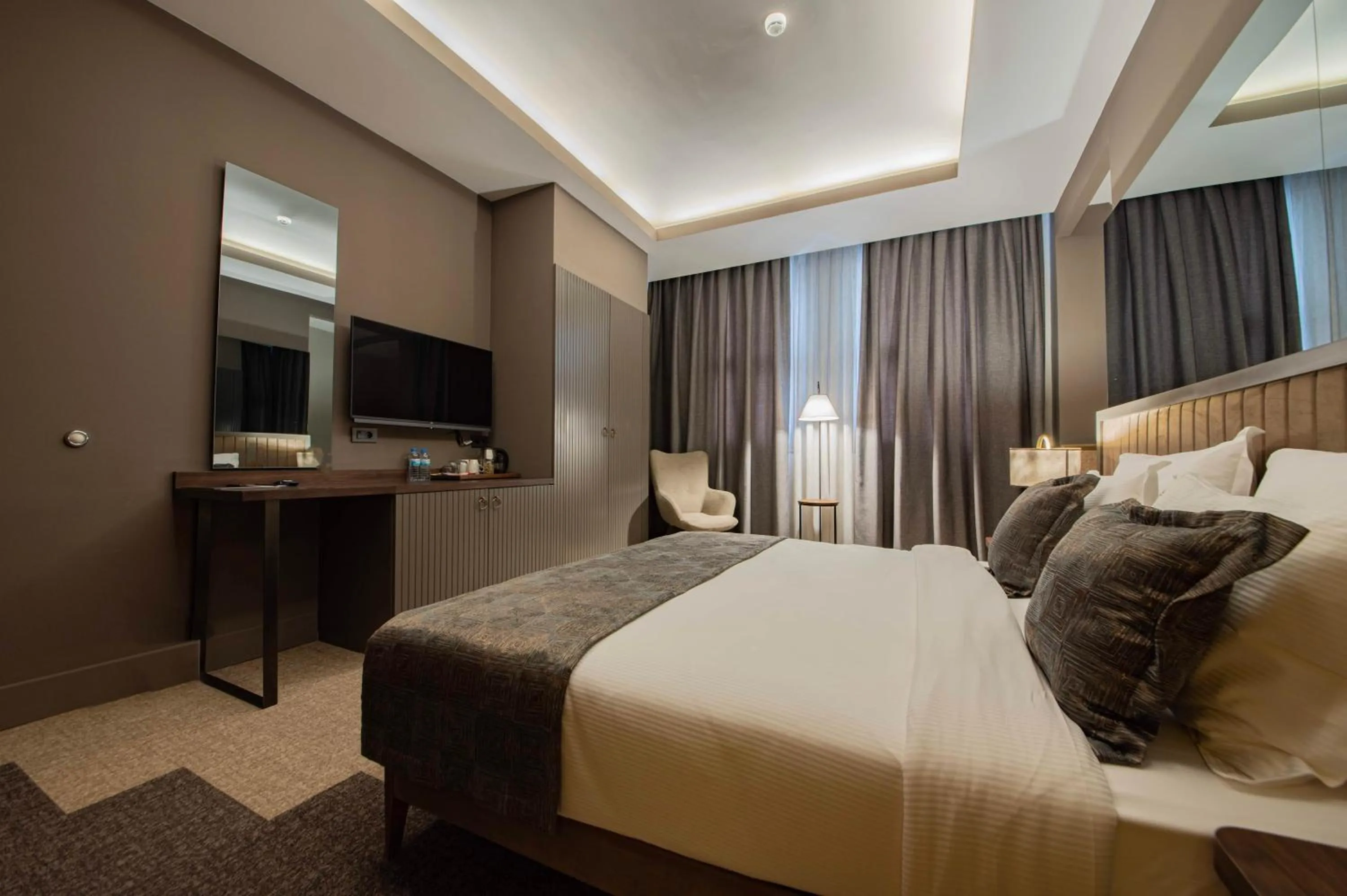 Bed in Four Mansions Hotel