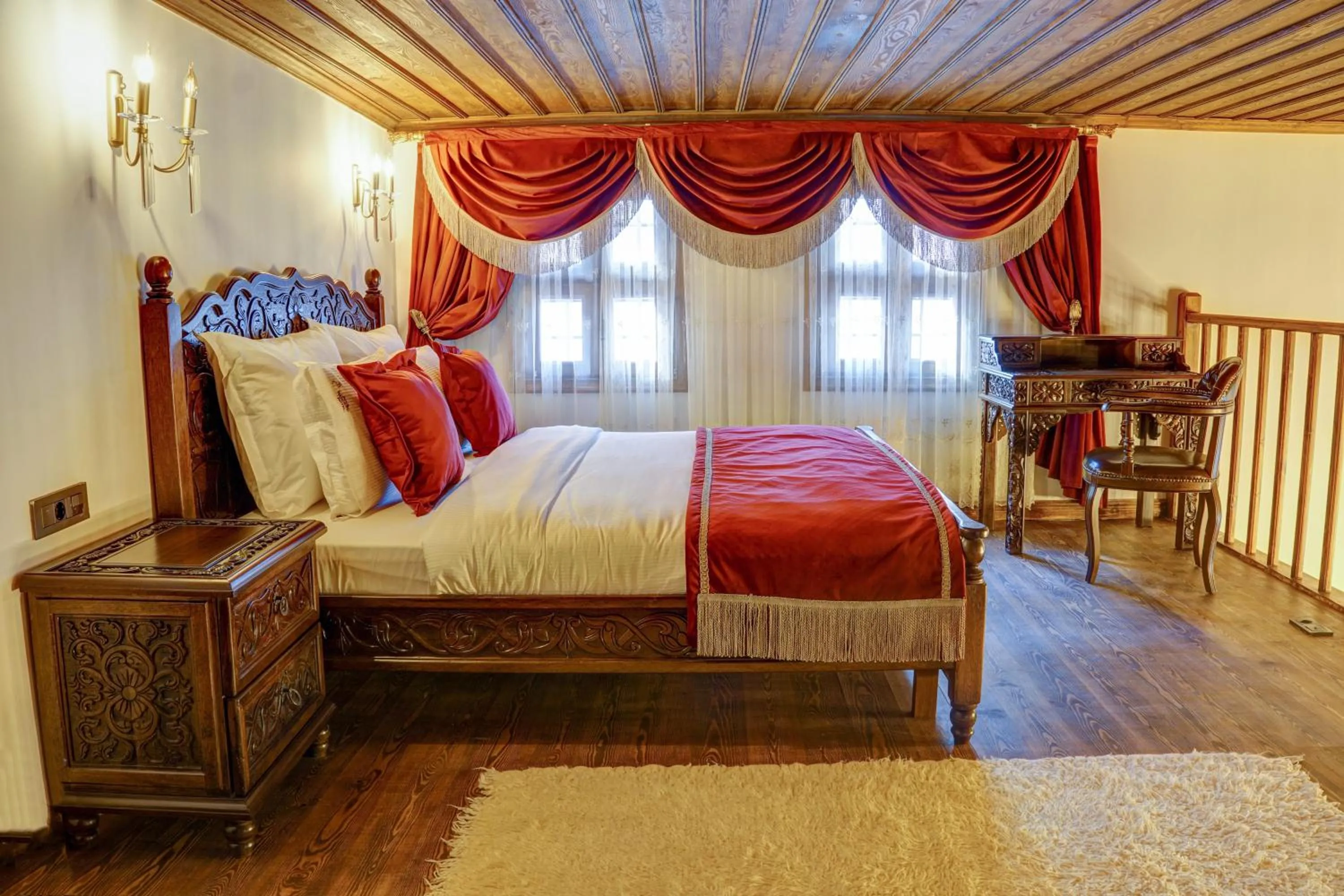 Bed in Four Mansions Hotel