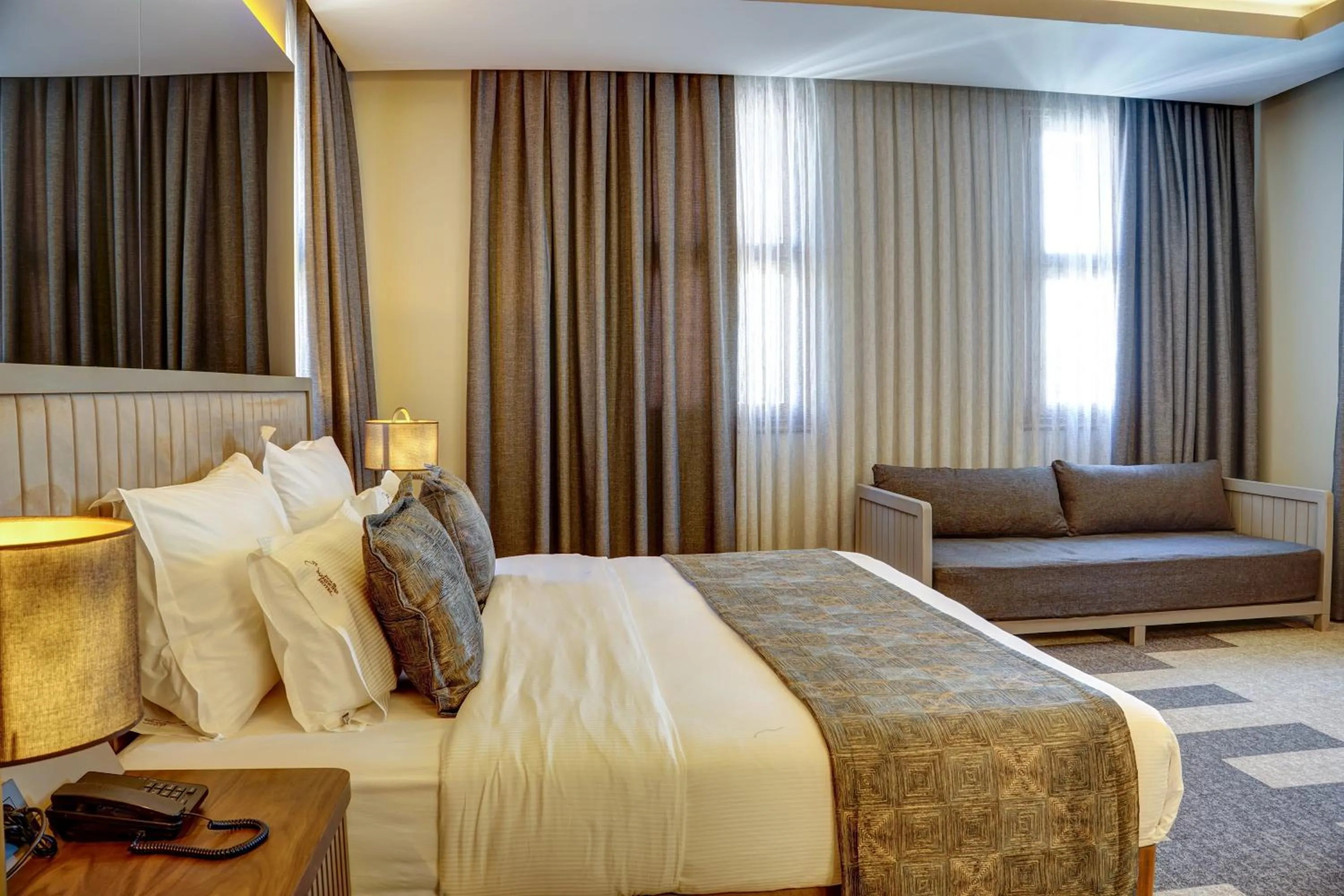 Bed in Four Mansions Hotel