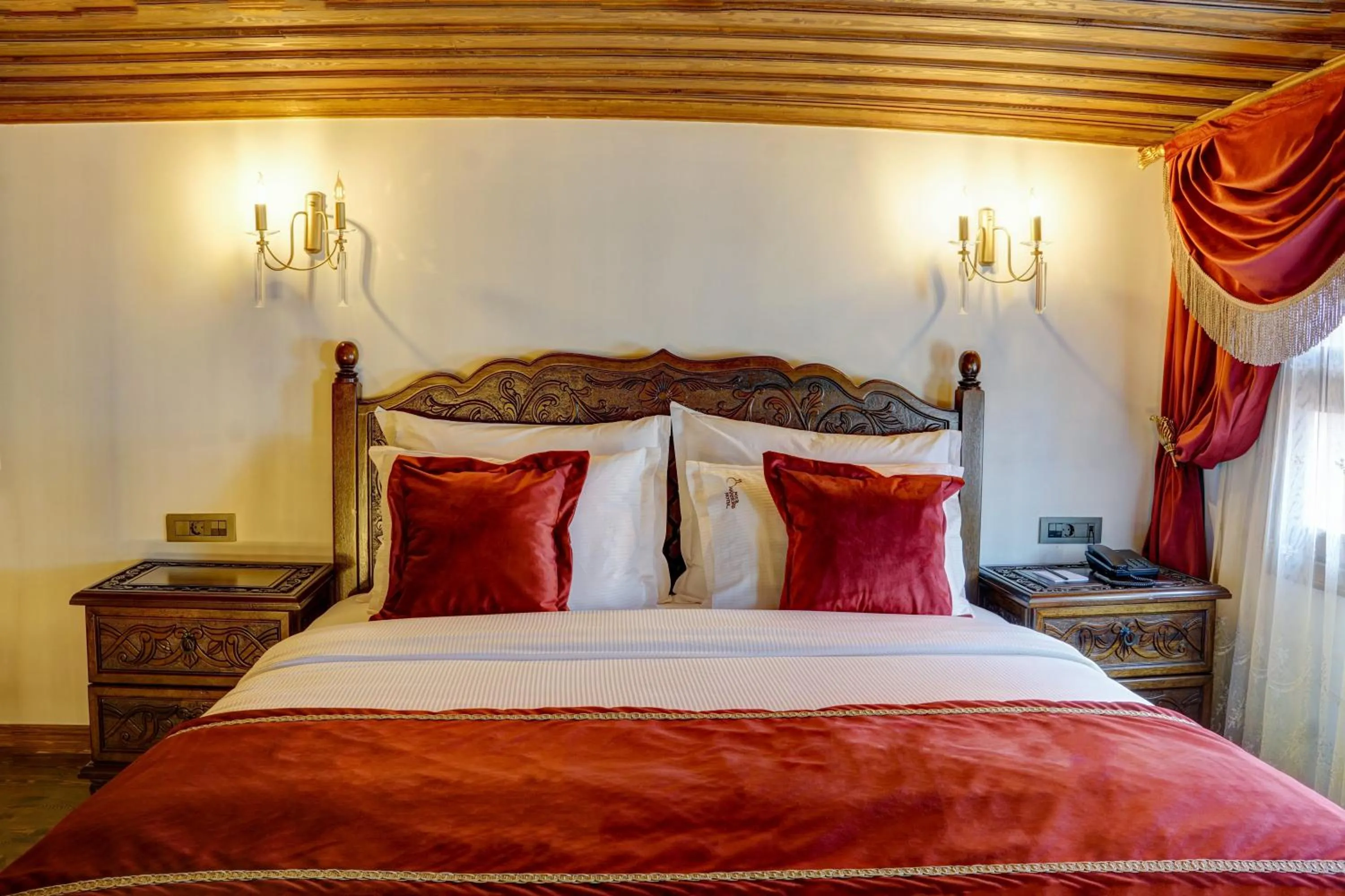 Bed in Four Mansions Hotel