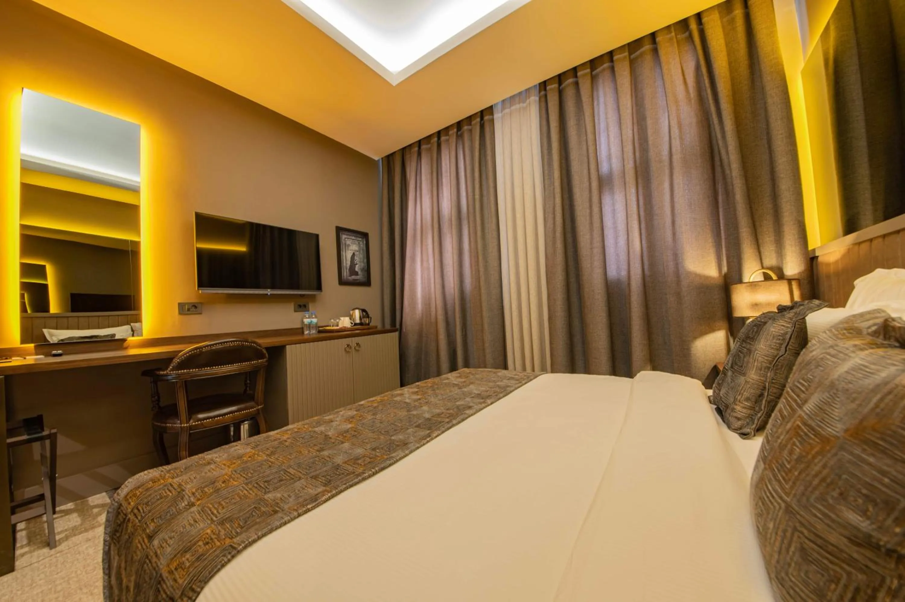 Bed in Four Mansions Hotel