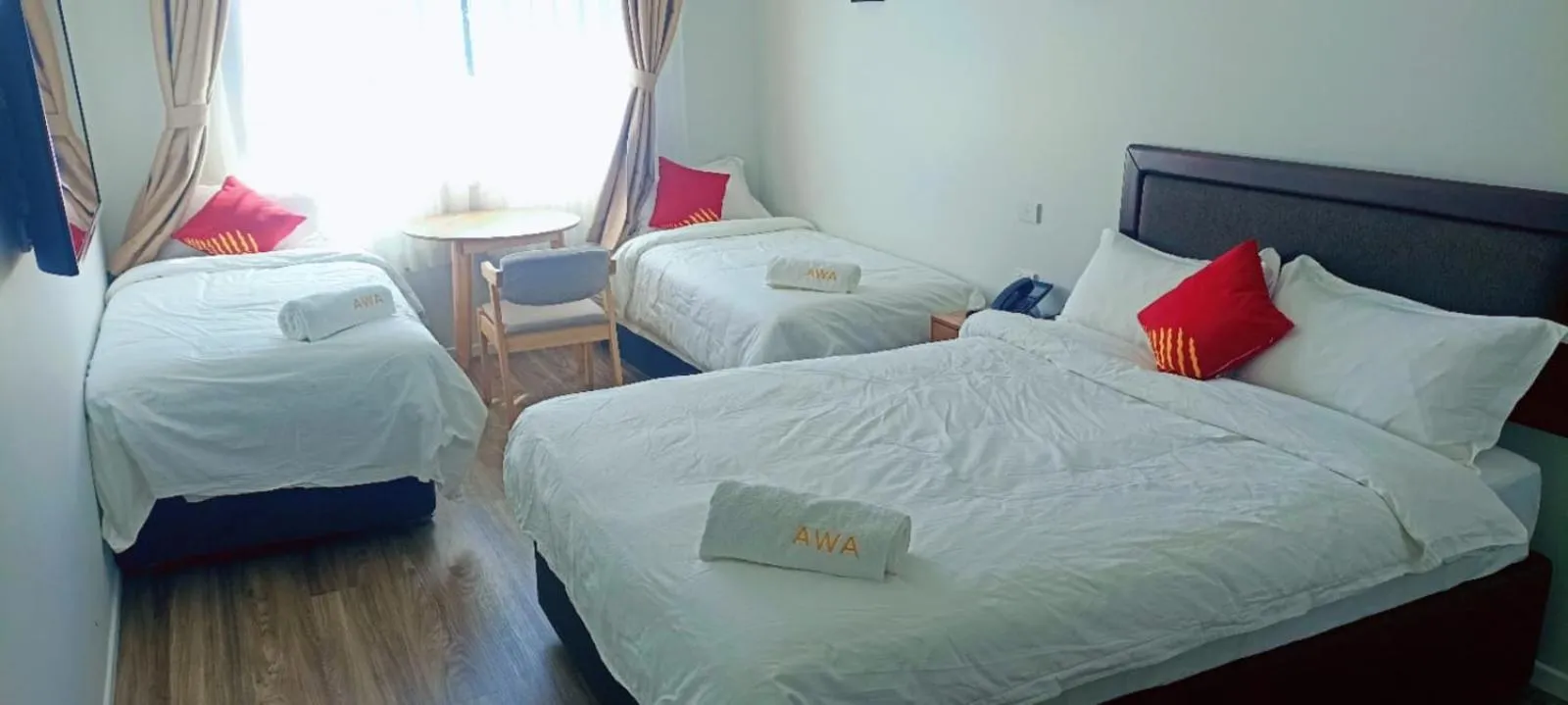 towels, Bed in AWA Hotel