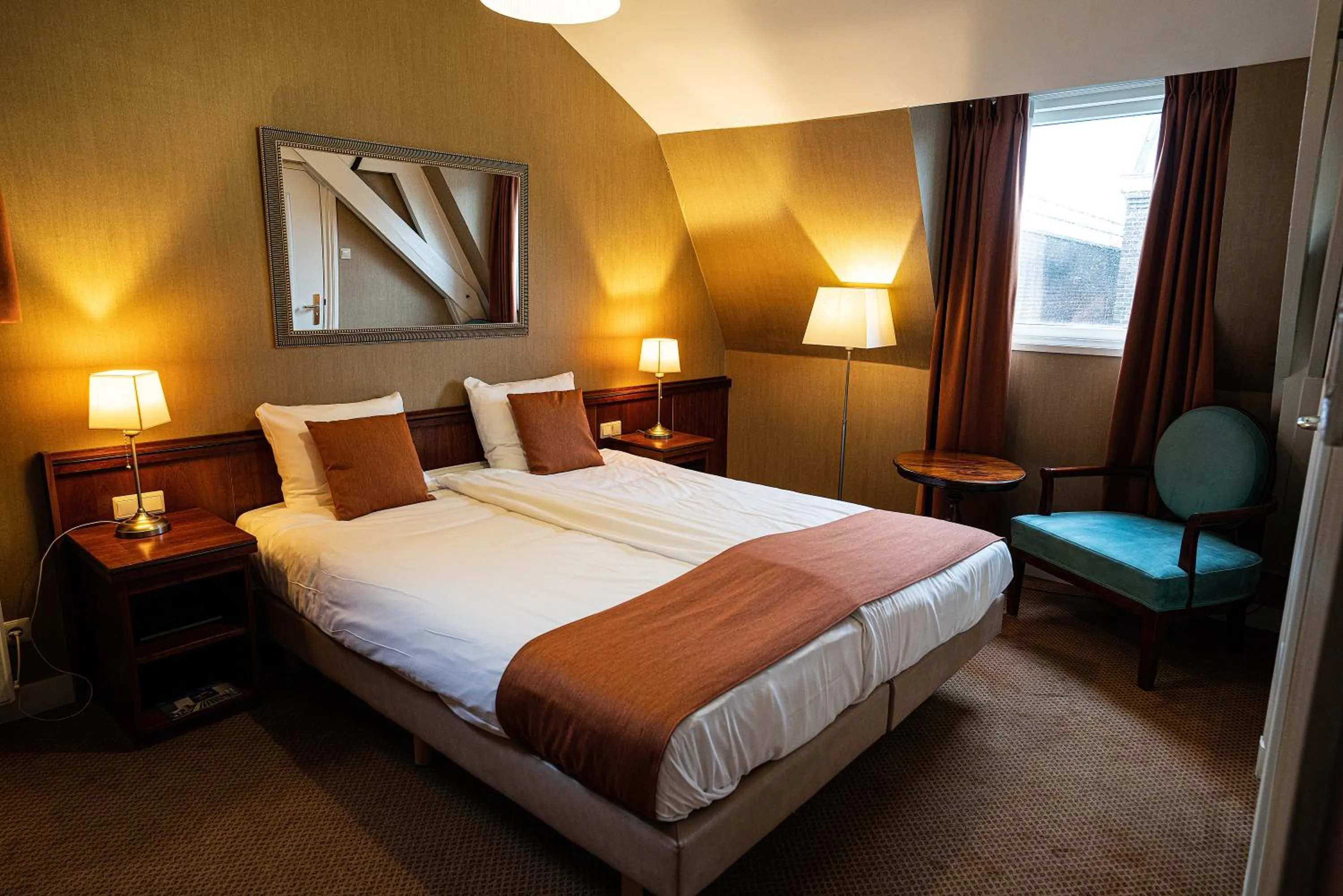 Bed in Hotel Johannes Vermeer Delft