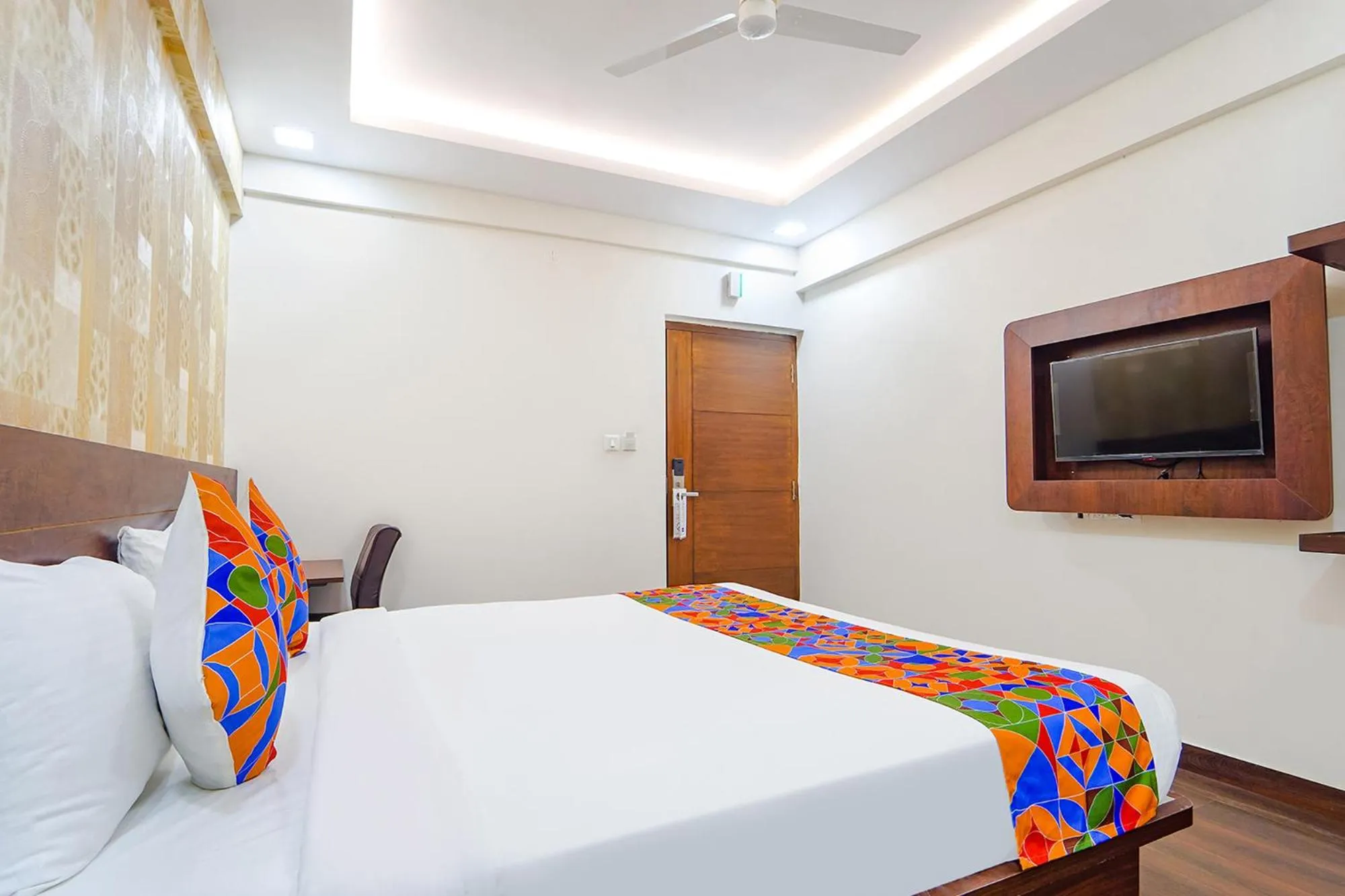 Bed in FabHotel Ellegant Inn