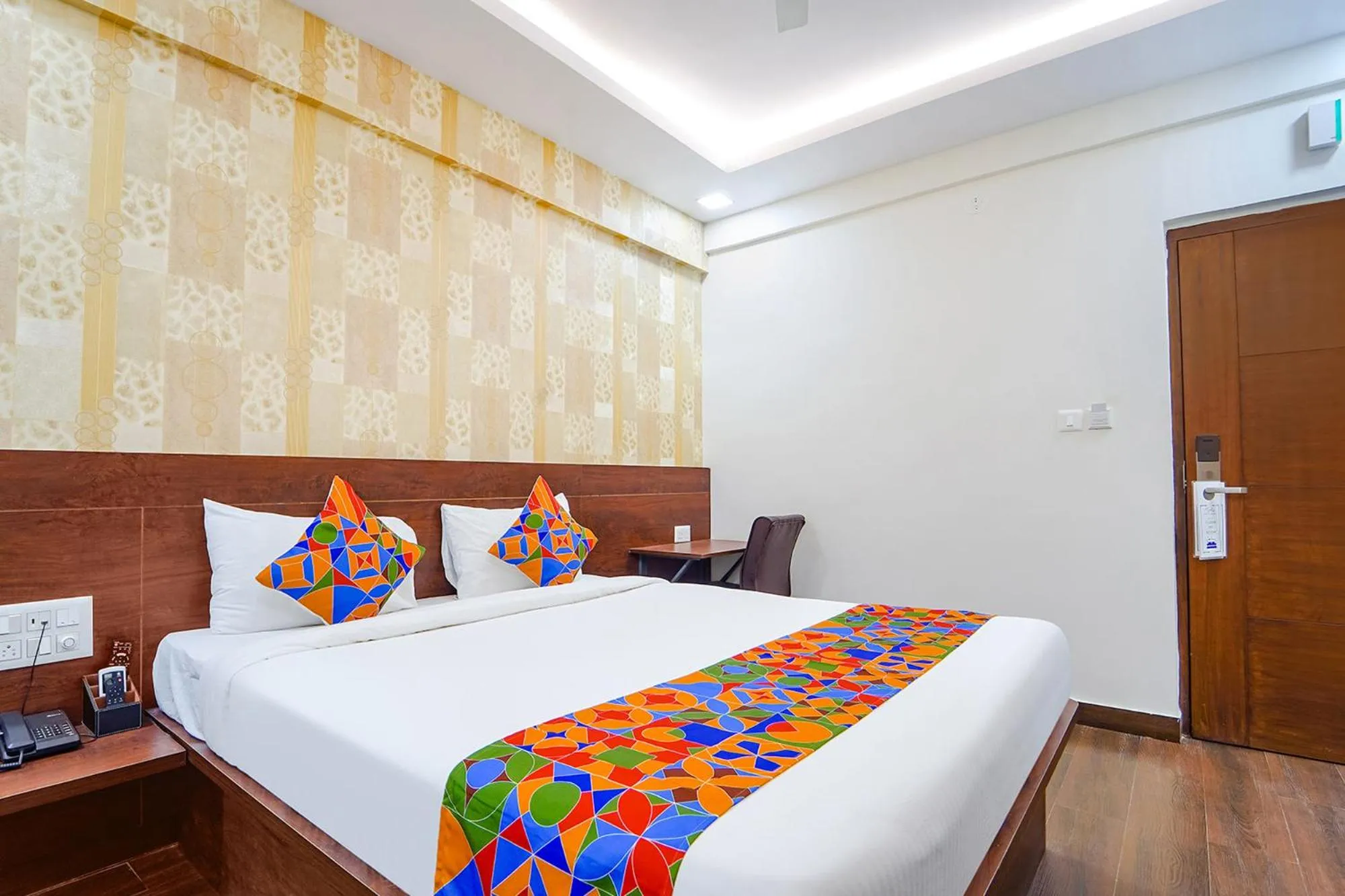 Bed in FabHotel Ellegant Inn