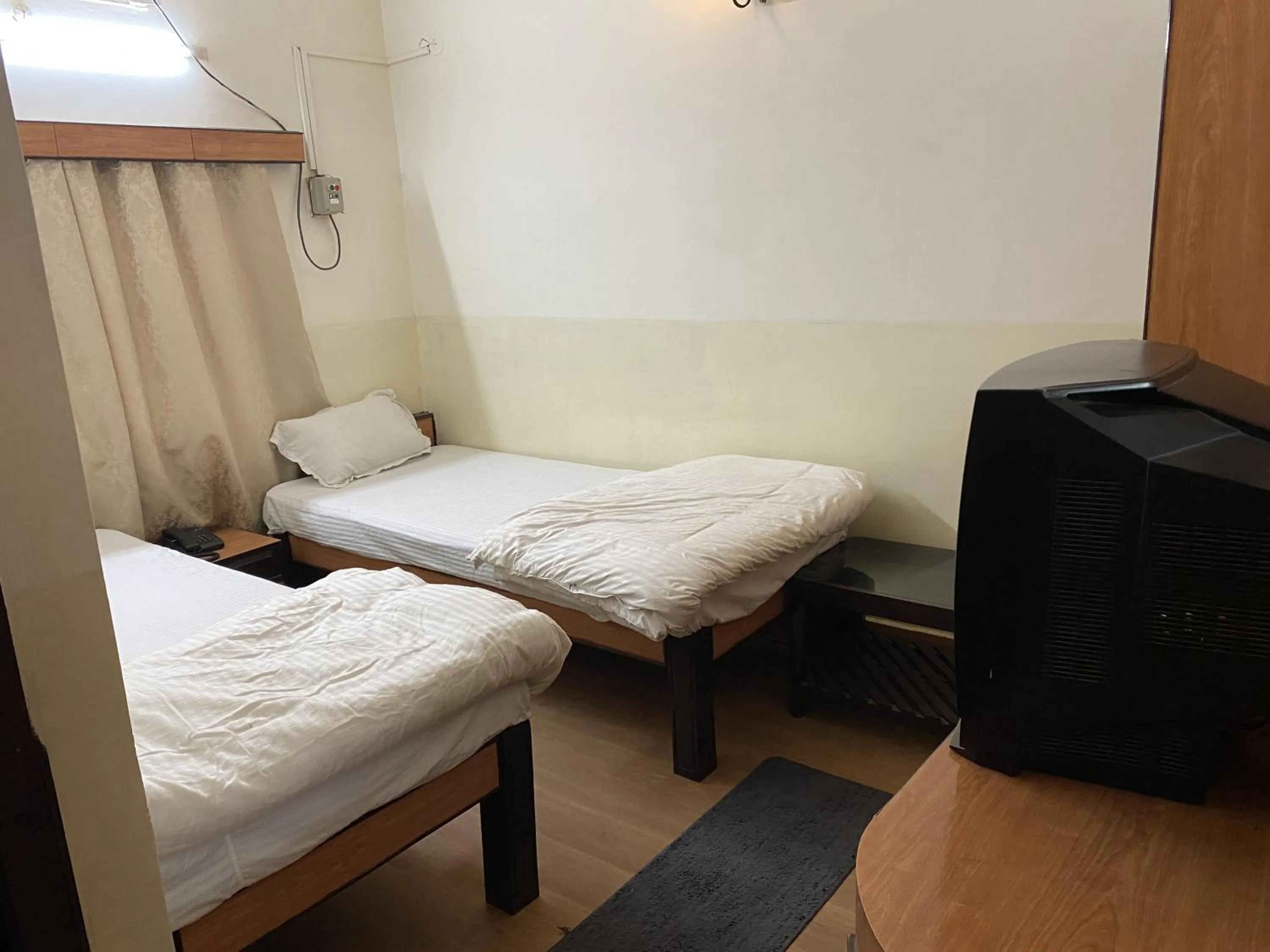 Photo of the whole room, Bed in Hotel Mayur