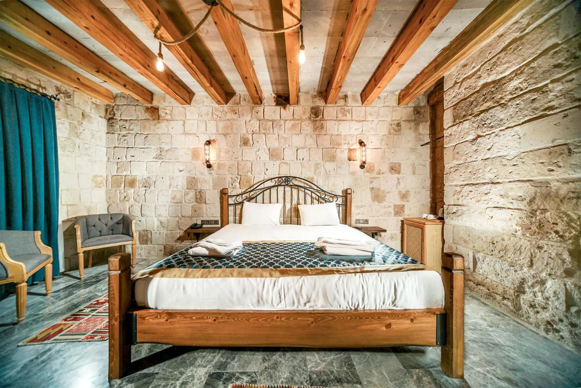 Bed in Caverna Hotel Premium Caves