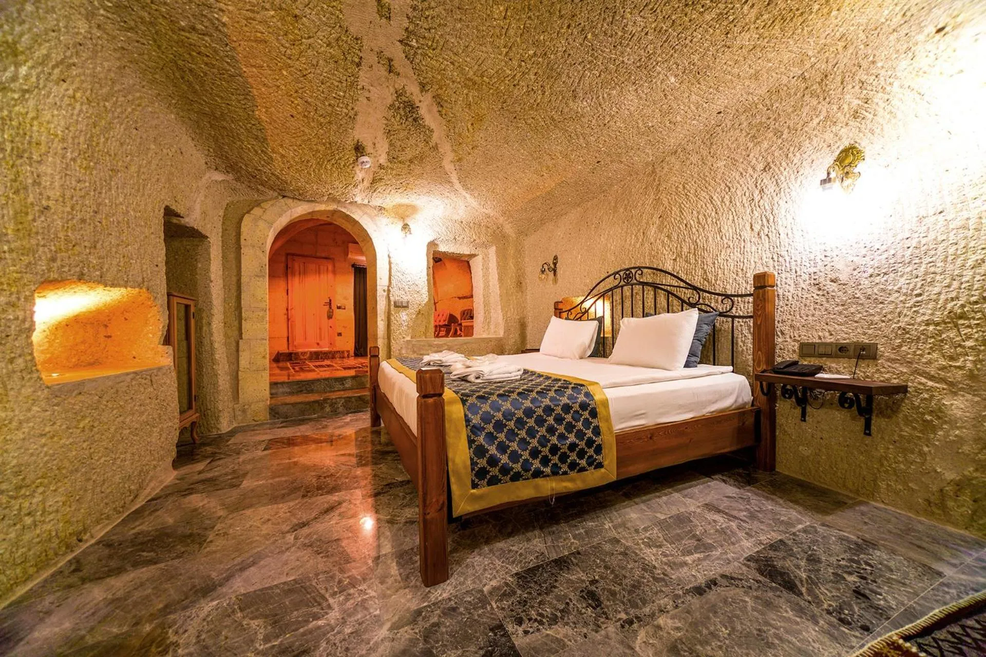 Bed in Caverna Hotel Premium Caves