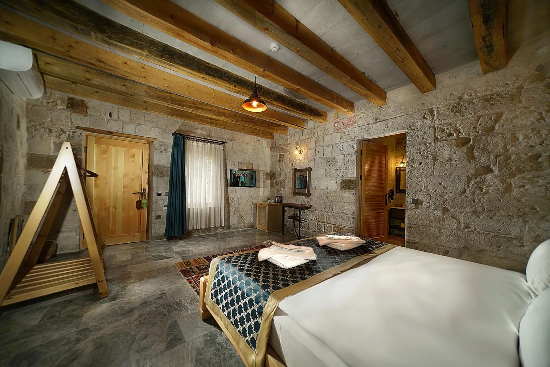 Bed in Caverna Hotel Premium Caves