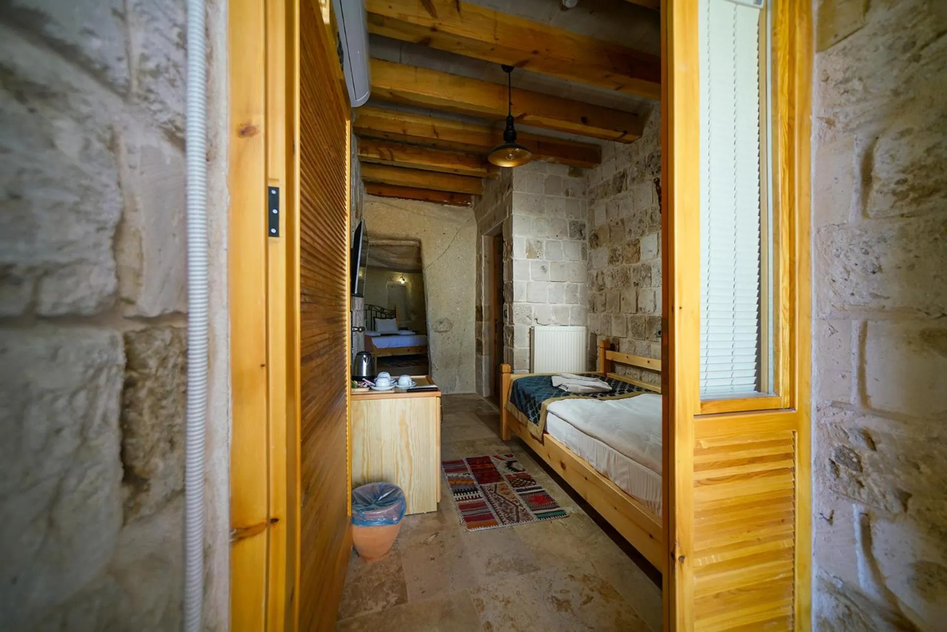 Bed in Caverna Hotel Premium Caves