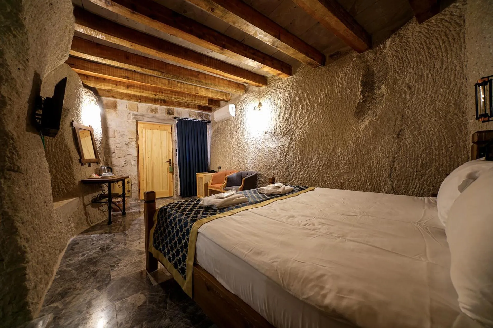 Bed in Caverna Hotel Premium Caves