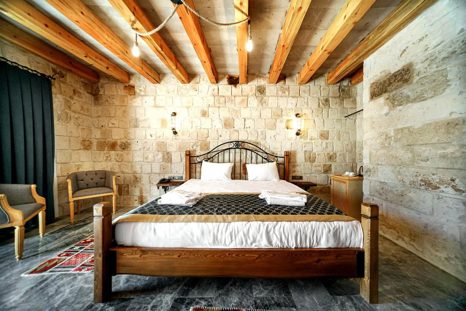 Bed in Caverna Hotel Premium Caves