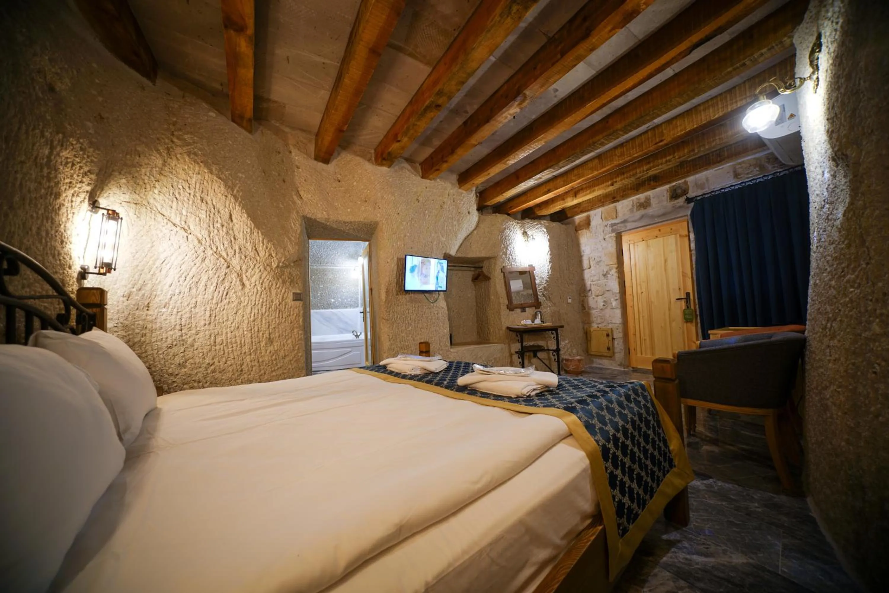Bed in Caverna Hotel Premium Caves