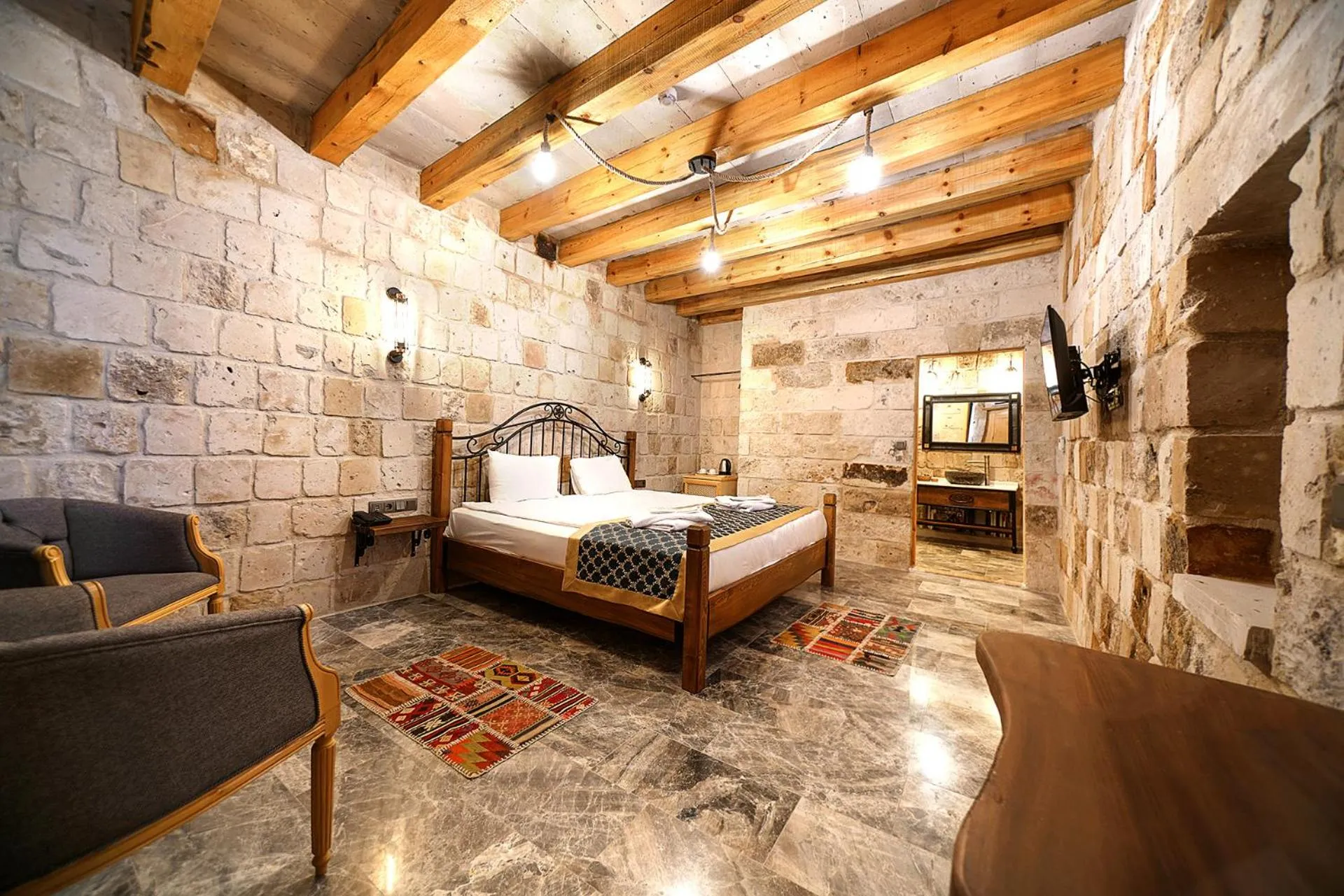 Bed in Caverna Hotel Premium Caves