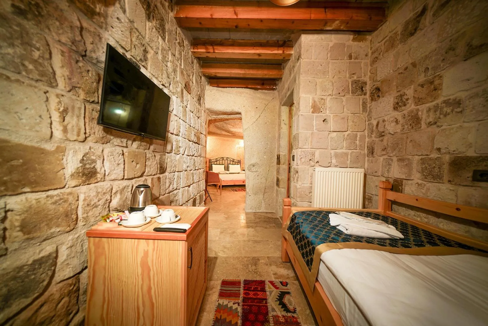 Bed in Caverna Hotel Premium Caves