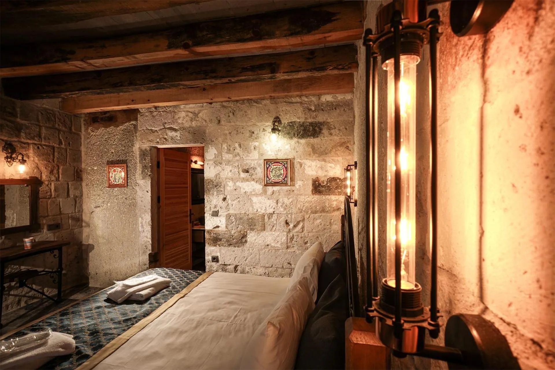 Bed in Caverna Hotel Premium Caves