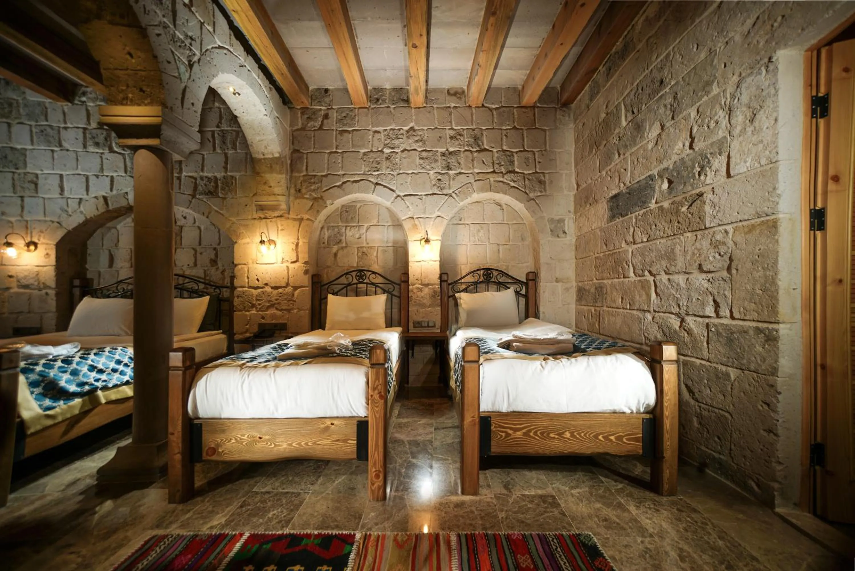 Bed in Caverna Hotel Premium Caves