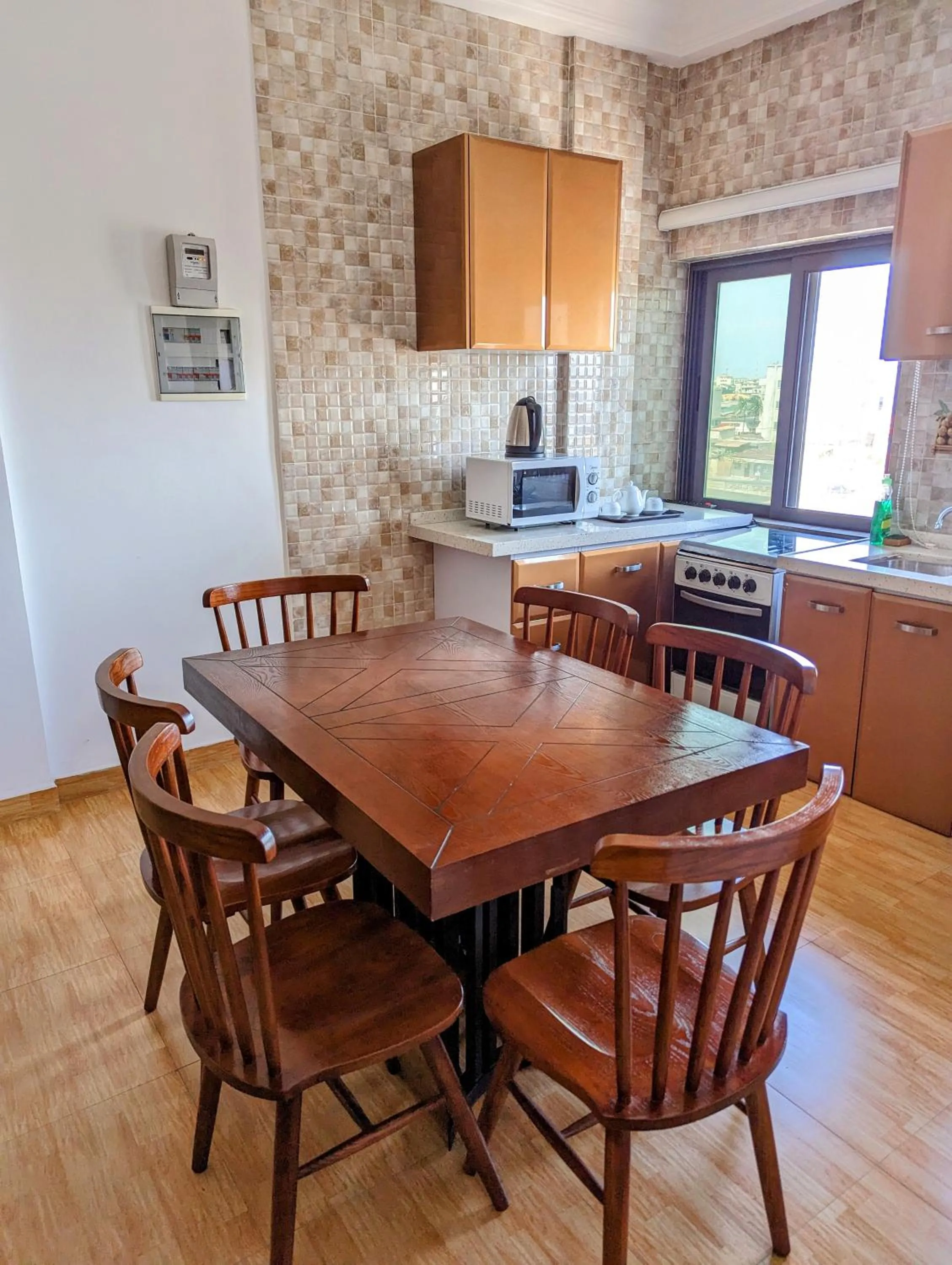 Kitchen or kitchenette in Les Ombrelles Appart'Hotel