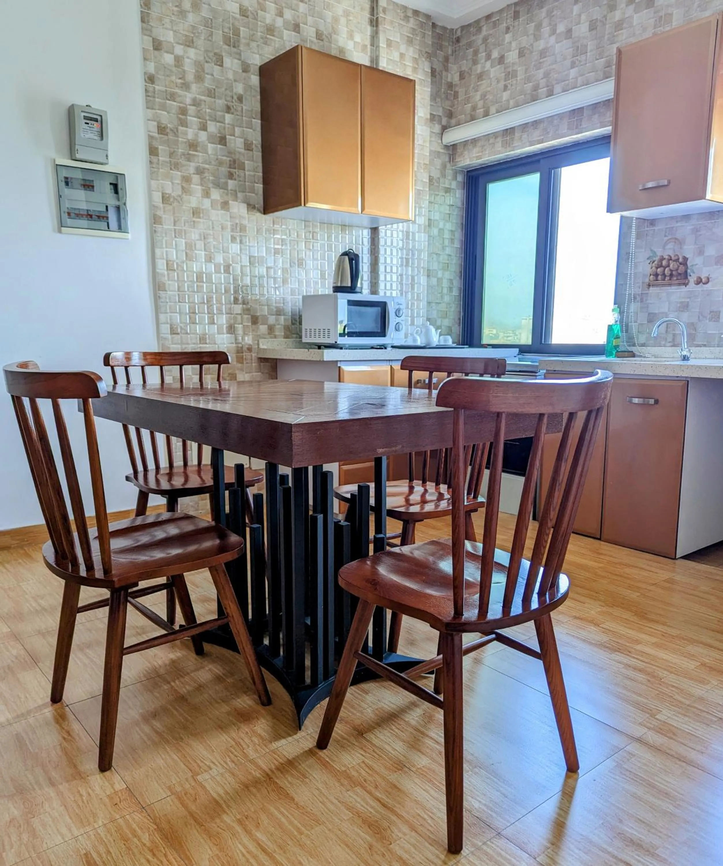 Kitchen or kitchenette in Les Ombrelles Appart'Hotel