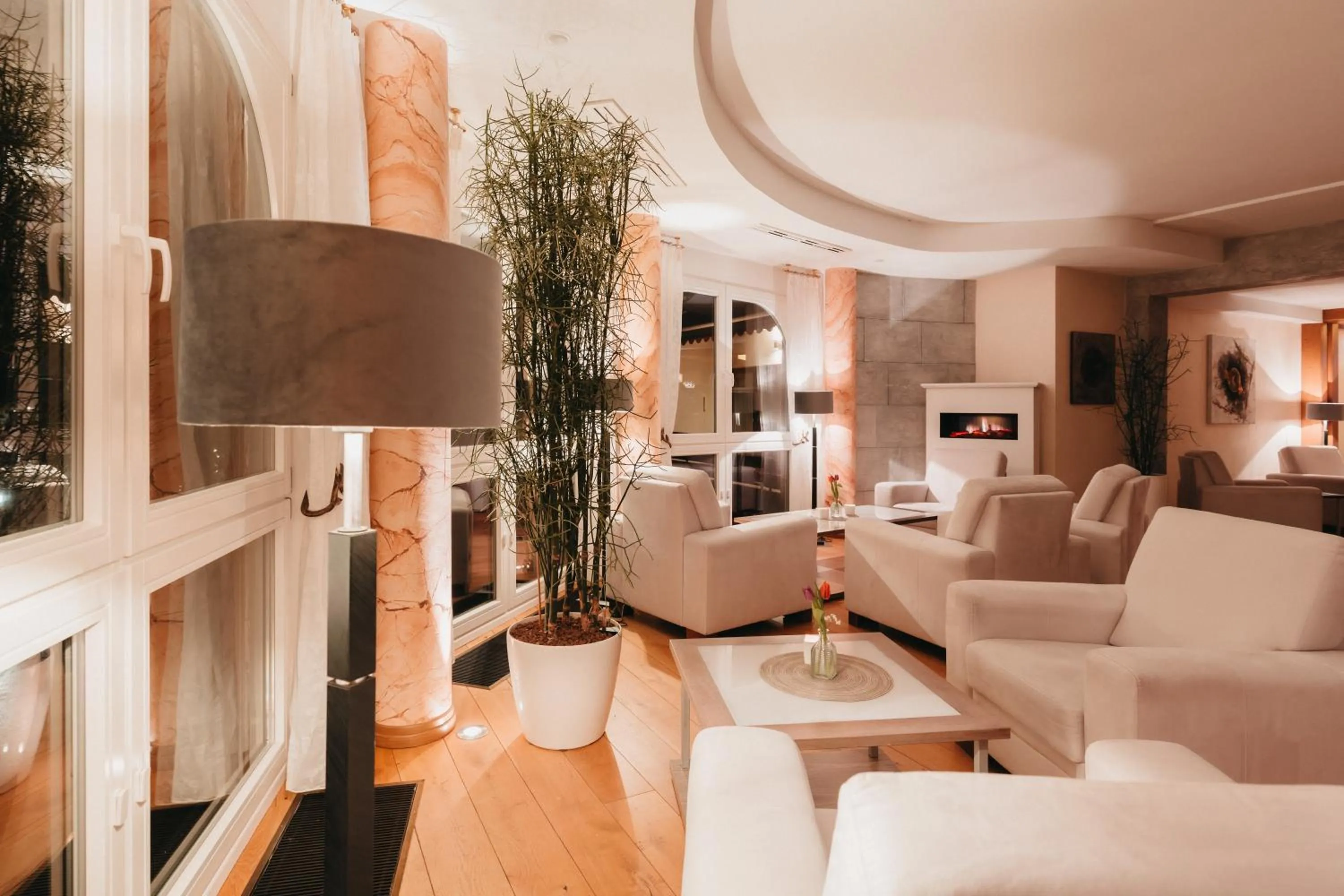 Communal lounge/ TV room in Wellnesshotel Sonnenhalde Tonbach