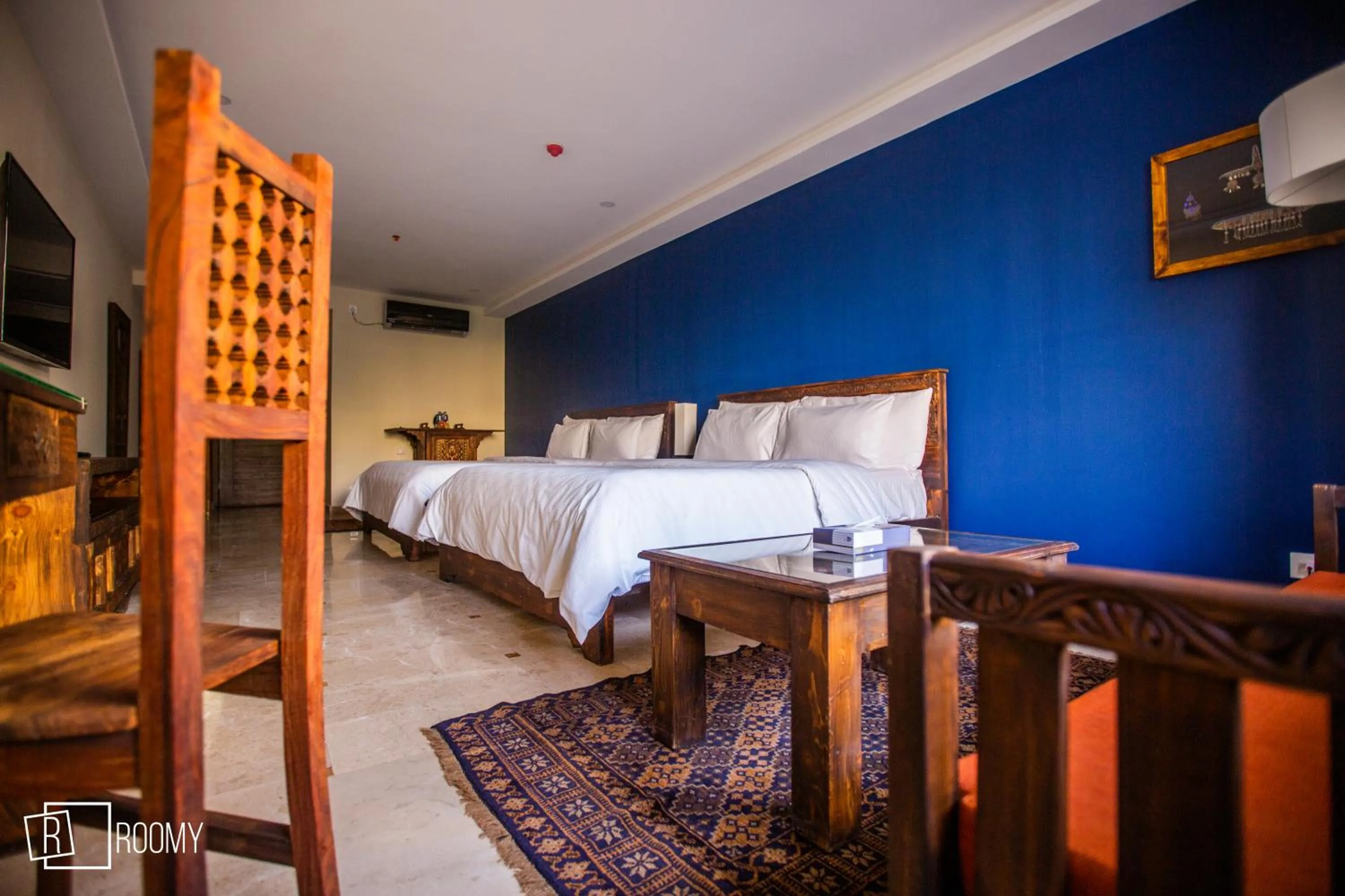 Bed in Roomy Signature Hotel, Islamabad