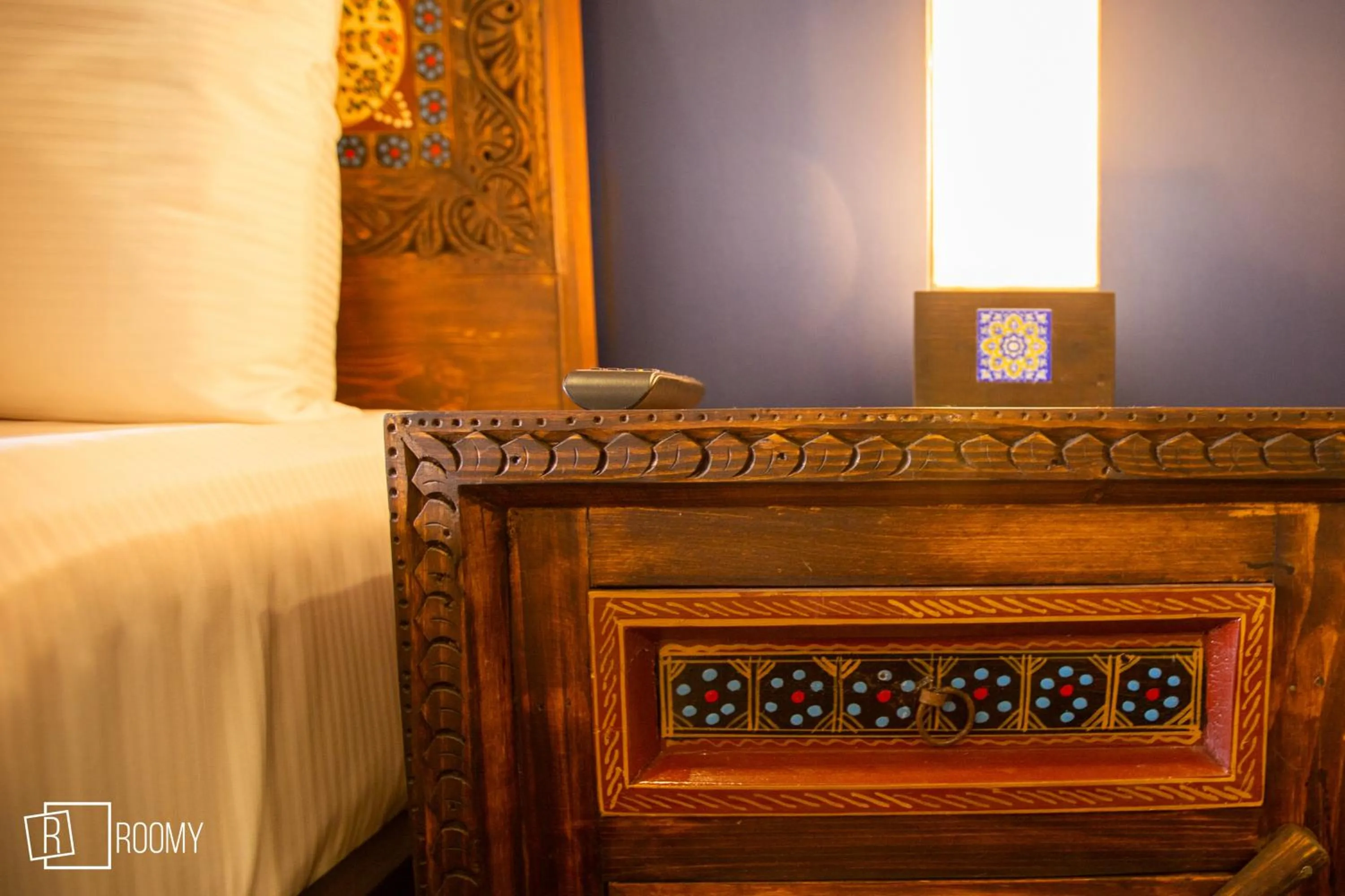 Bed in Roomy Signature Hotel, Islamabad