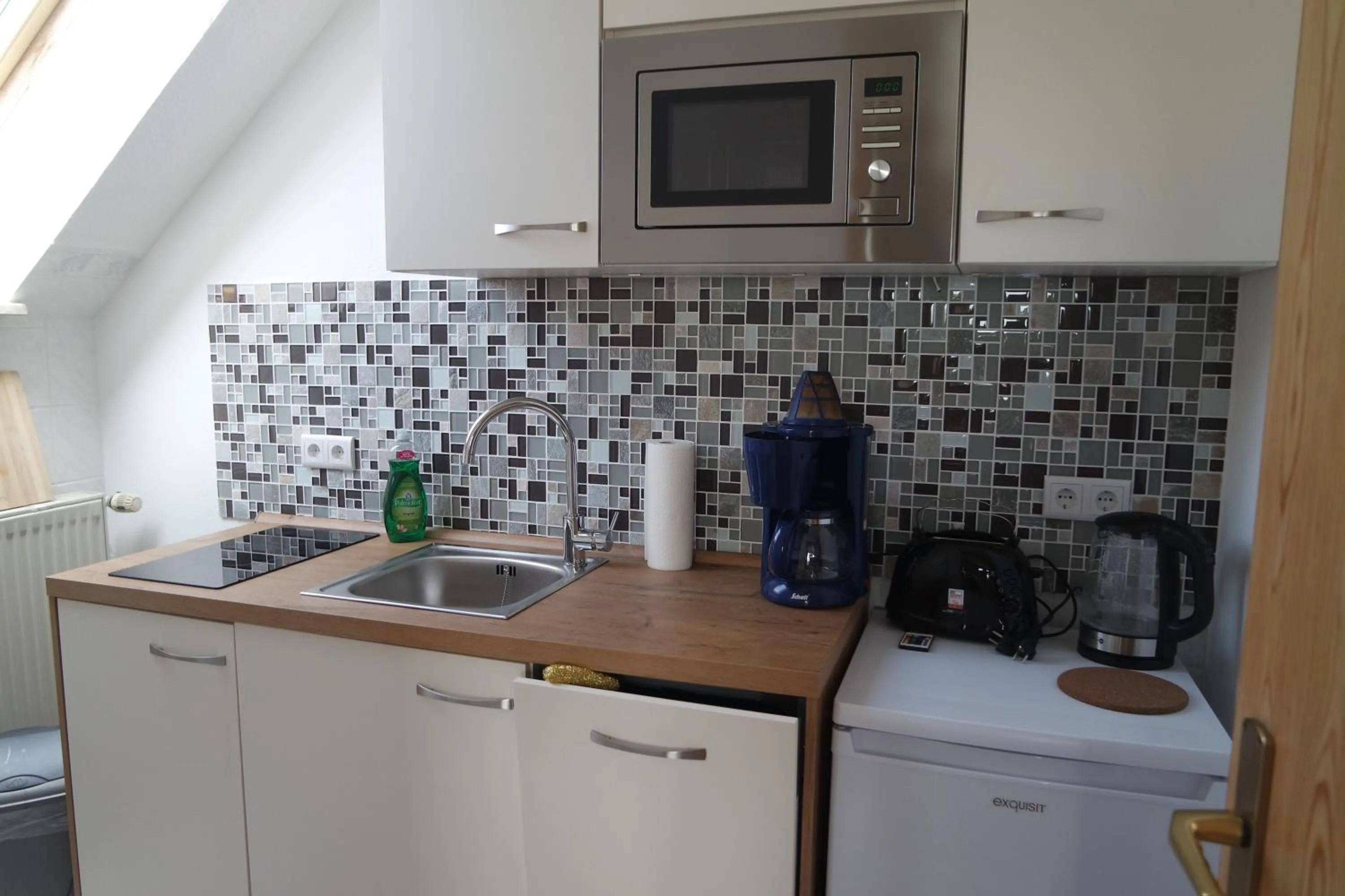 Kitchen or kitchenette in Aparthotel Schafshorn