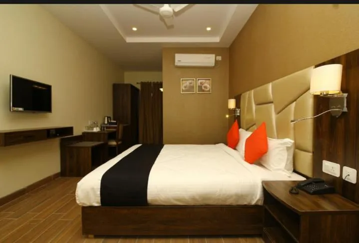 Bed in Hotel Sindhura Grand